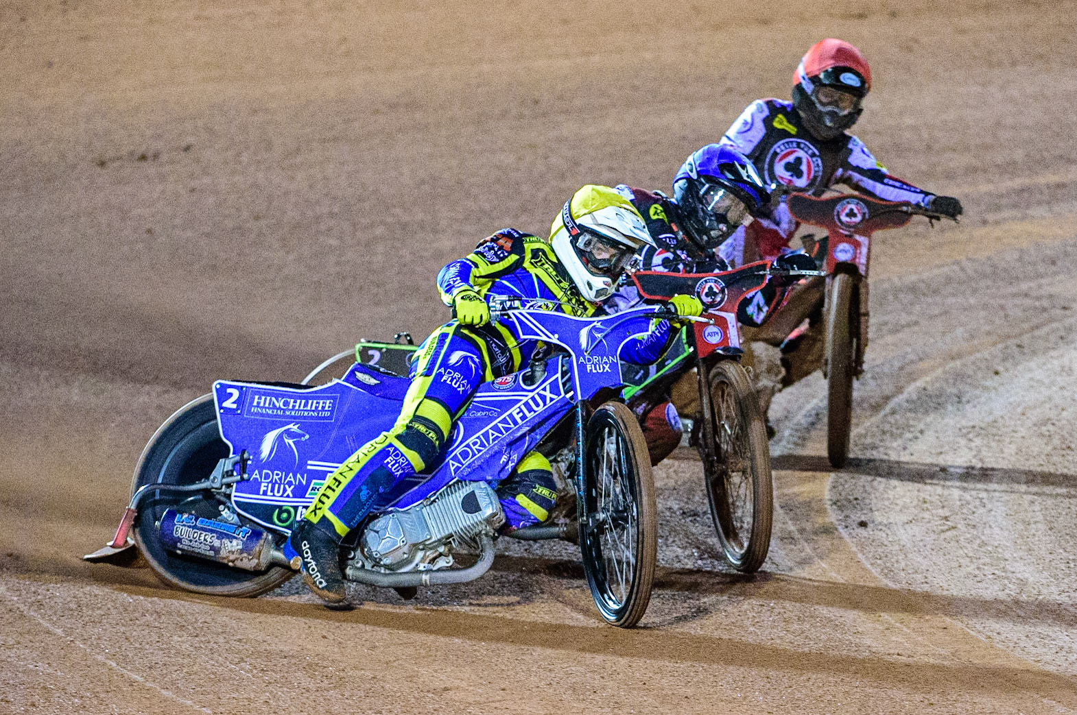Lewis Kerr  (Yellow) leads Tom Brennan  (Blue) and Brady Kurtz  (Red) during the SGB Premiership Grand Final 1st leg between Belle Vue Aces and Sheffield Tigers at the National Speedway Stadium, Manchester on Monday 10th October 2022. (Credit: Ian Charles | MI News)