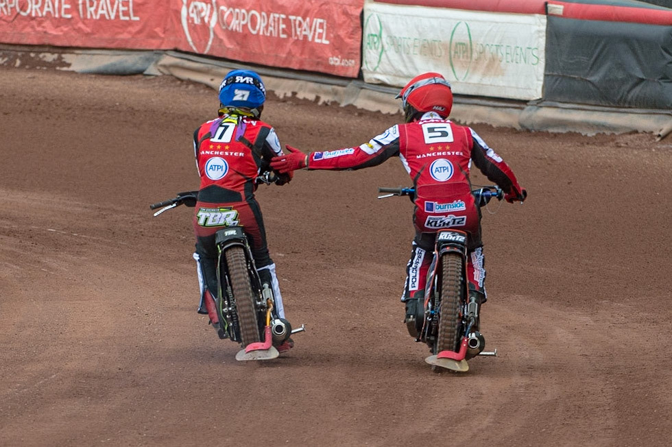 MANCHESTER, UK. JUN 13TH Brady Kurtz  (Red) congratulates Tom Brennan (Blue) on their heat win during the SGB Premiership match between Belle Vue Aces and Wolverhampton  Wolves at the National Speedway Stadium, Manchester on Monday 13th June 2022. (Credit: Ian Charles | MI News)