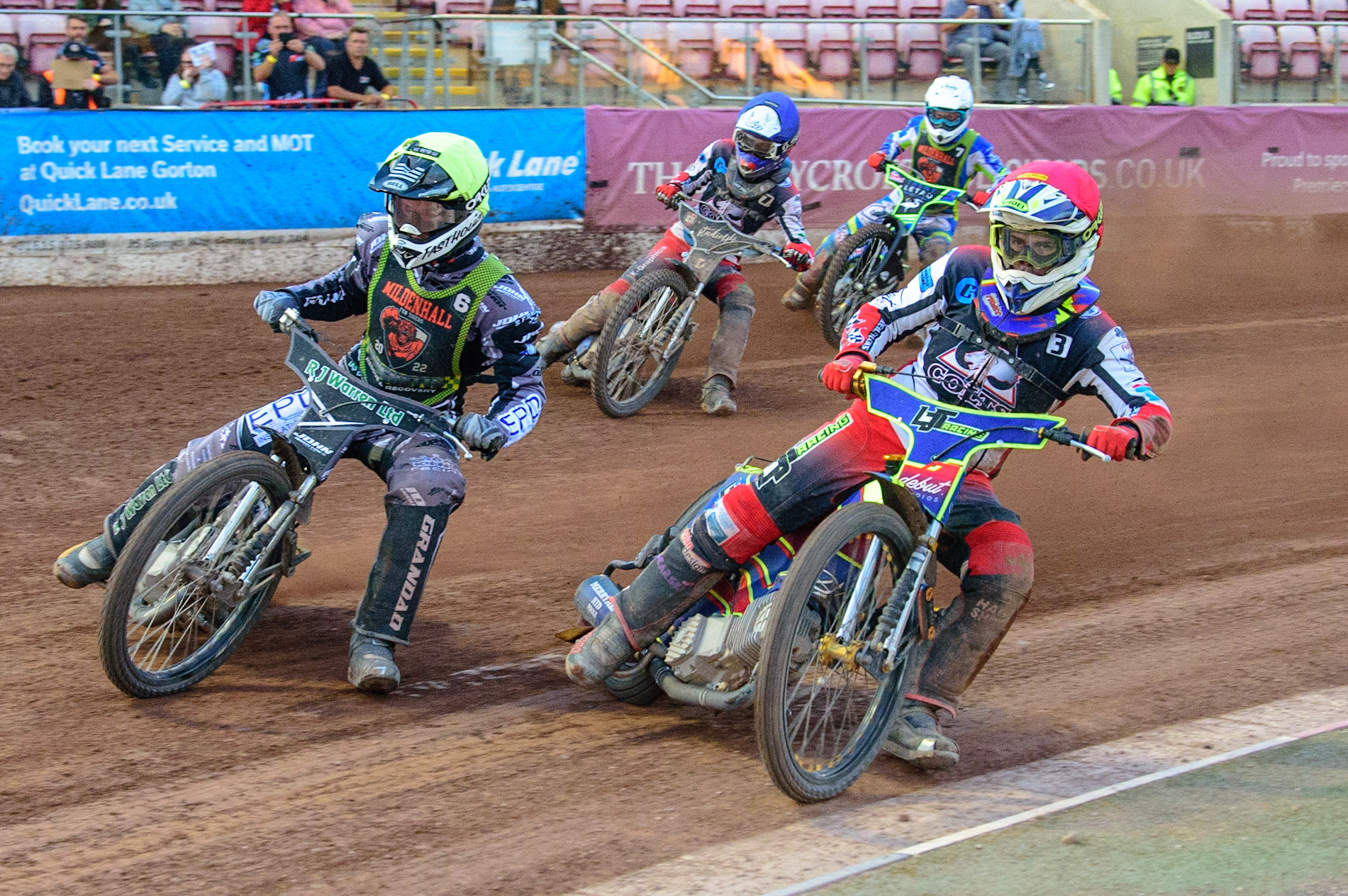 Nathan Ablitt   (Red) inside Josh Warren  (Yellow) with Freddy Hodder  (Blue) and Luke Muff  (White) behind during the National Development League match between Belle Vue Colts and Mildenhall Fens Tigers at the National Speedway Stadium, Manchester on Friday 15th July 2022. (Credit: Ian Charles | MI News)