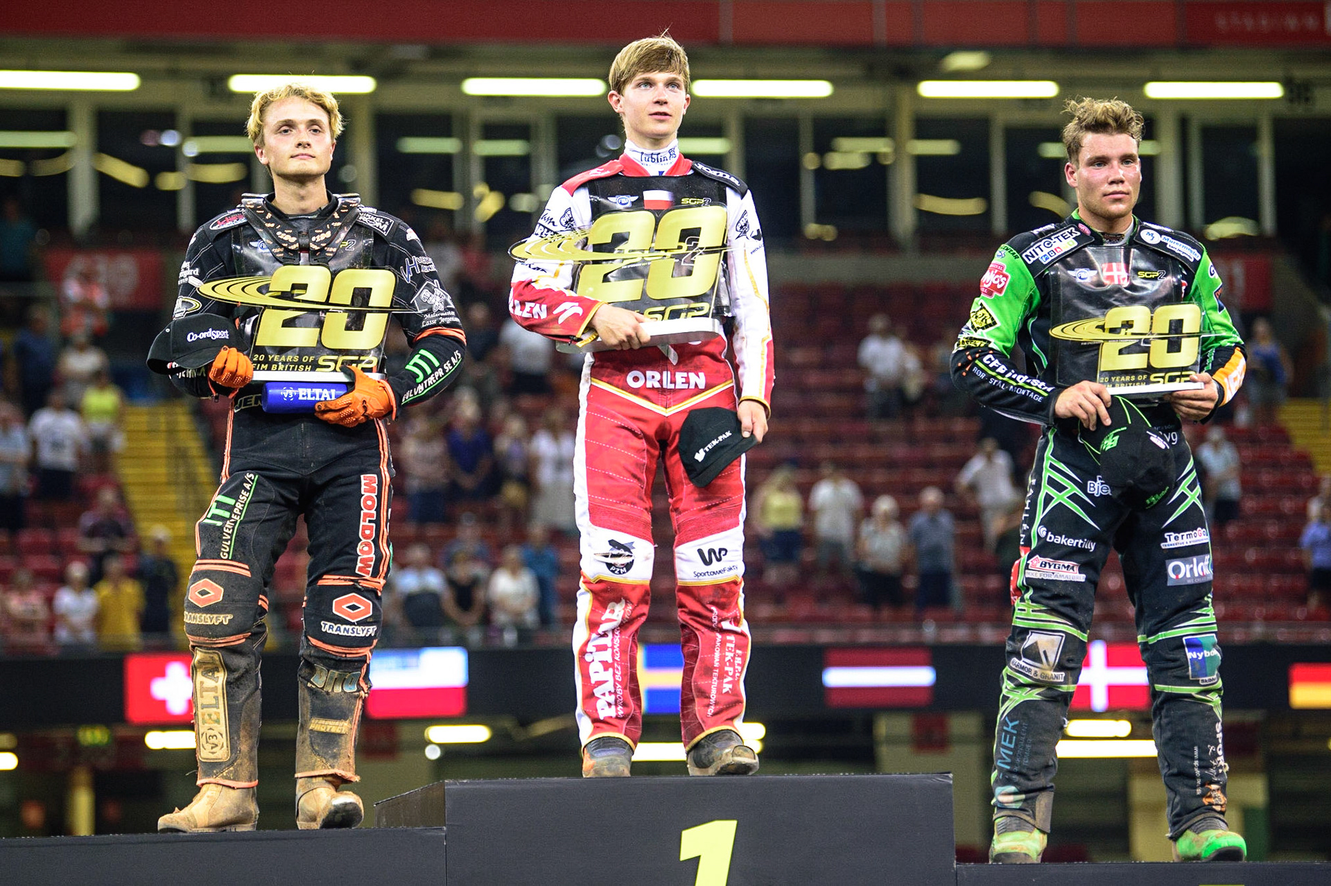 Top 3: (l - r) Kevin Juhl Pedersen (Denmark)   (2nd), Mateusz Cierniak (Poland)  (1st)Benjamin Basso (Denmark)  (3rd) during the FIM  Speedway Grand Prix  2 of Great Britain at the Principality Stadium, Cardiff on Sunday 14th August 2022. (Credit: Ian Charles | MI News)