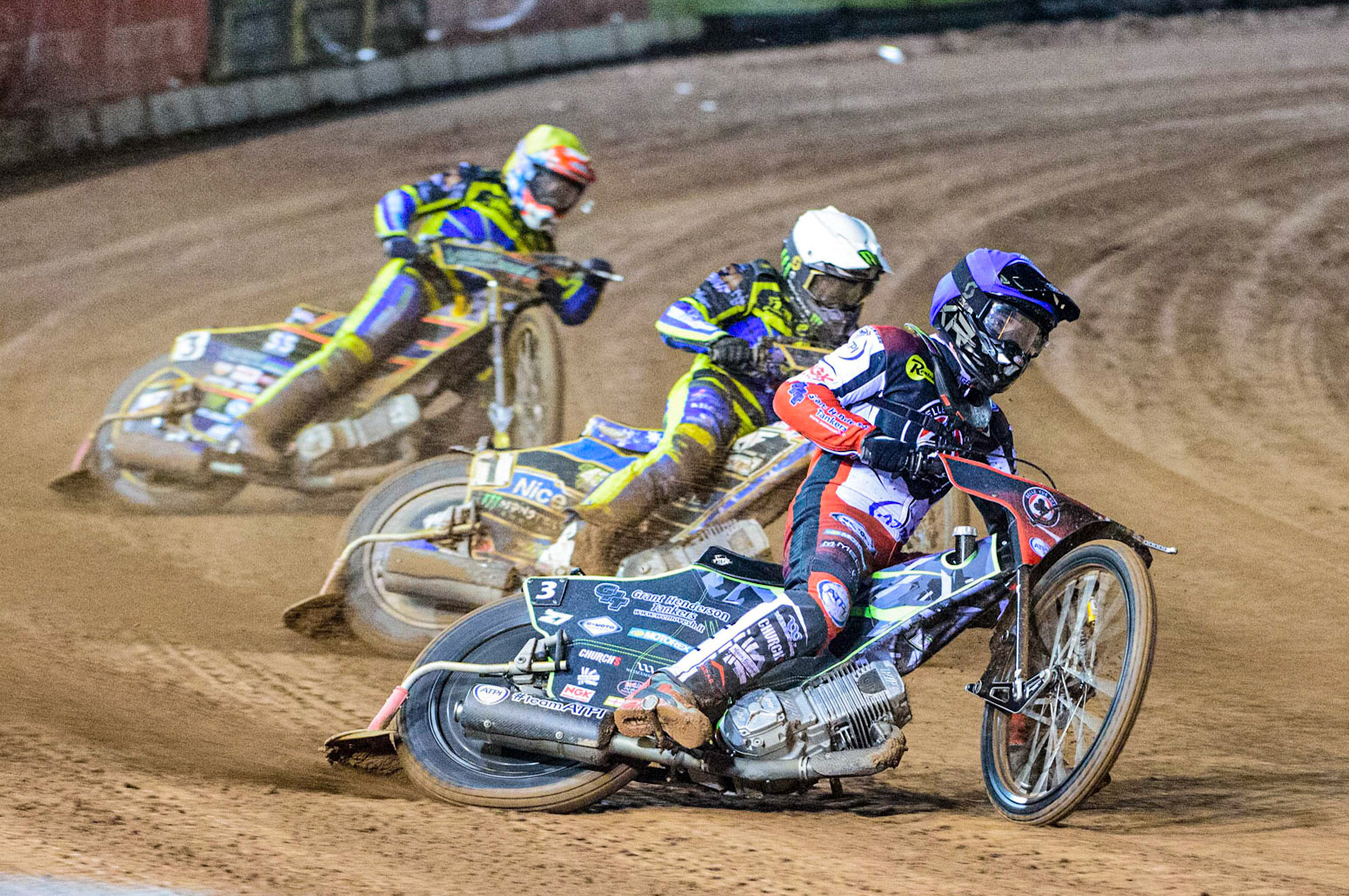 Tom Brennan (Blue) leads Jack Holder (White) and Connor Mountain (Yellow)  during the Grant Henderson Pairs at the National Speedway Stadium, Manchester on Thursday 27th October 2022. (Credit: Ian Charles | MI NEWS)