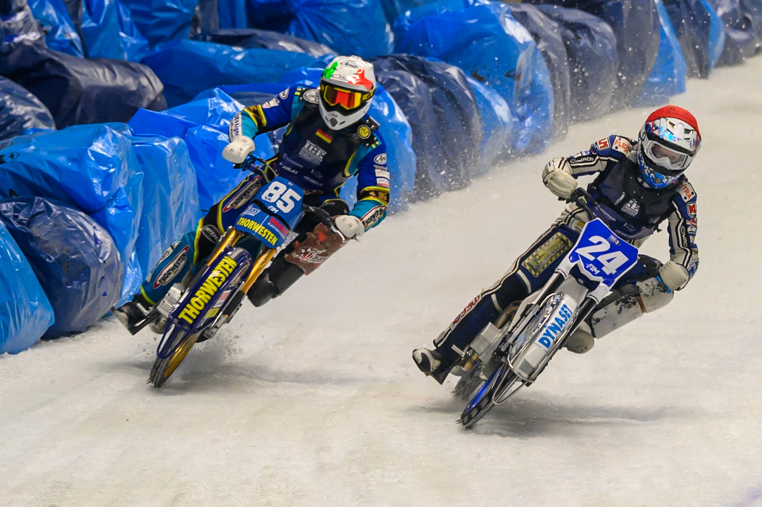 Max Koivula (24) of Finland in Red rides insideLuca Bauer (85) of Italy/Germany in White during the Ice Speedway Gladiators World Championship Final 2 at Max-Aicher-Arena, Inzell on Sunday 15th March 2026. (Photo: Ian Charles | MI News)