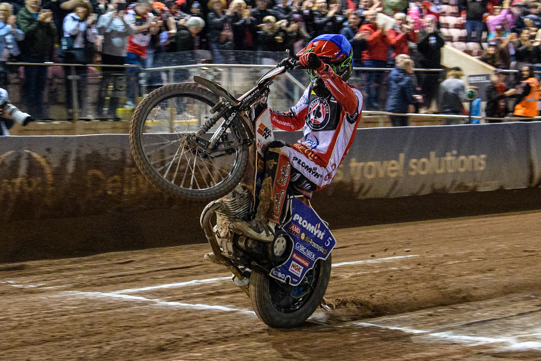 Belle Vue Aces' Dan Bewley  celebrates with a wheelie during the Rowe Motor Oil Premiership Play Off Semi Final 2, 1st Leg match between Belle Vue Aces and Sheffield Tigers at the National Speedway Stadium, Manchester on Monday 16th September 2024. (Photo: Ian Charles | MI News)