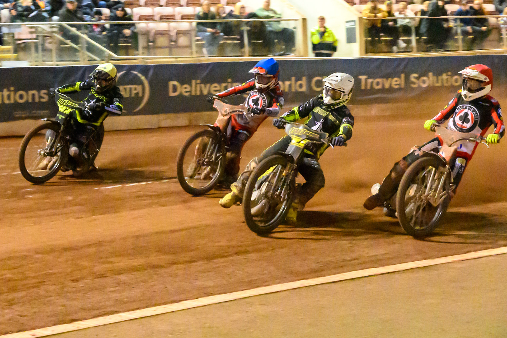 Tom Brennan of Ipswich Witches in White leading Peter Kildemand of Belle Vue Aces in Red, Zach Cook of Belle Vue Aces in Blue  and Danny King of Ipswich Witches in Yellow during the Rowe Motor Oil Premiership Play Off Semi Final 2nd leg match between Belle Vue Aces and Ipswich Witches at the National Speedway Stadium, Manchester on Monday 28th September 2026. (Photo: Ian Charles | MI News)