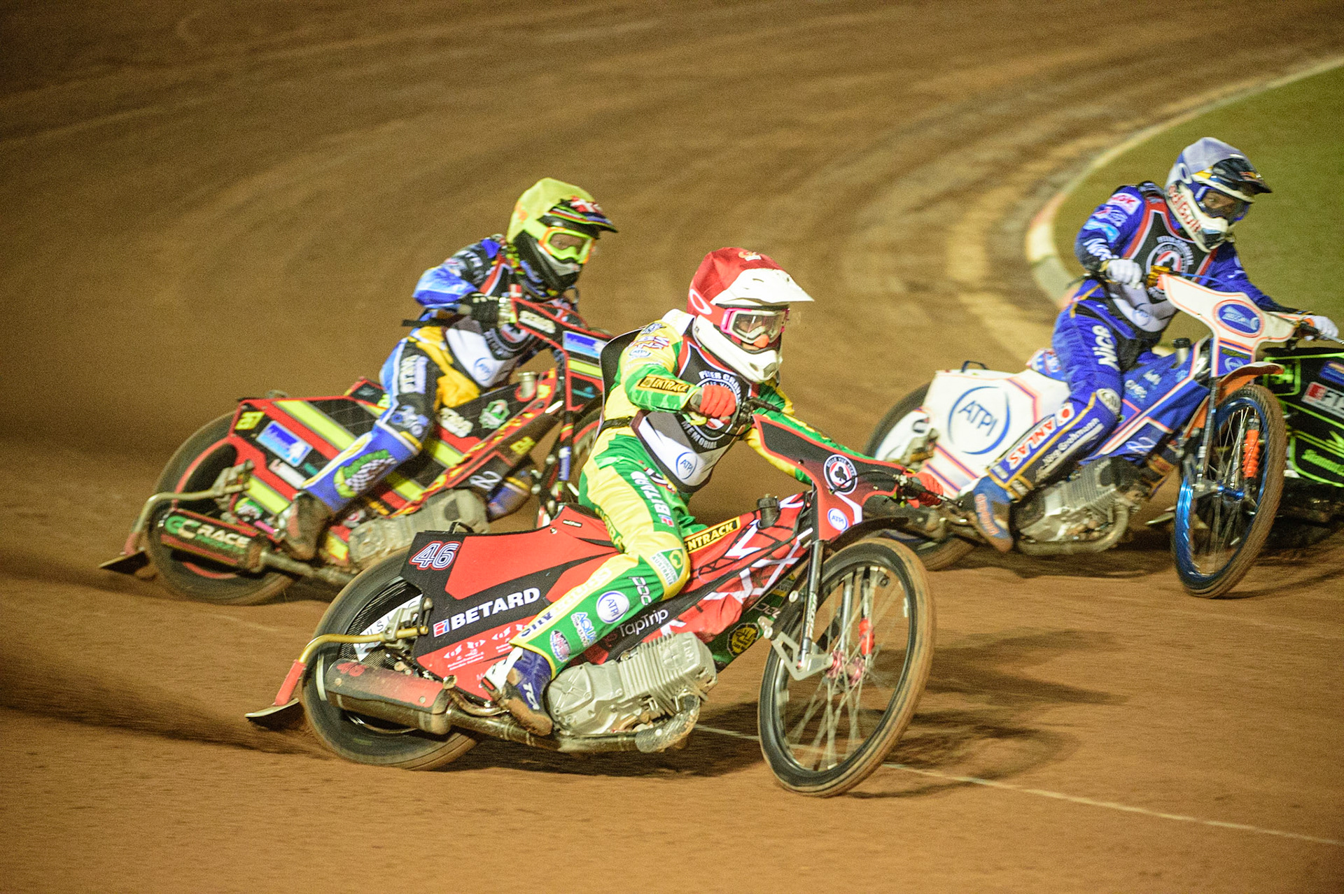 MANCHESTER, UK. MAR 21ST. Max Fricke (Red) outside Robert Lambert (White) with Michael Palm-Toft (Yellow) behind during the ATPI Peter Craven Memorial Trophy at the National Speedway Stadium, Manchester on Monday 21st March 2022. (Credit: Ian Charles | MI News)