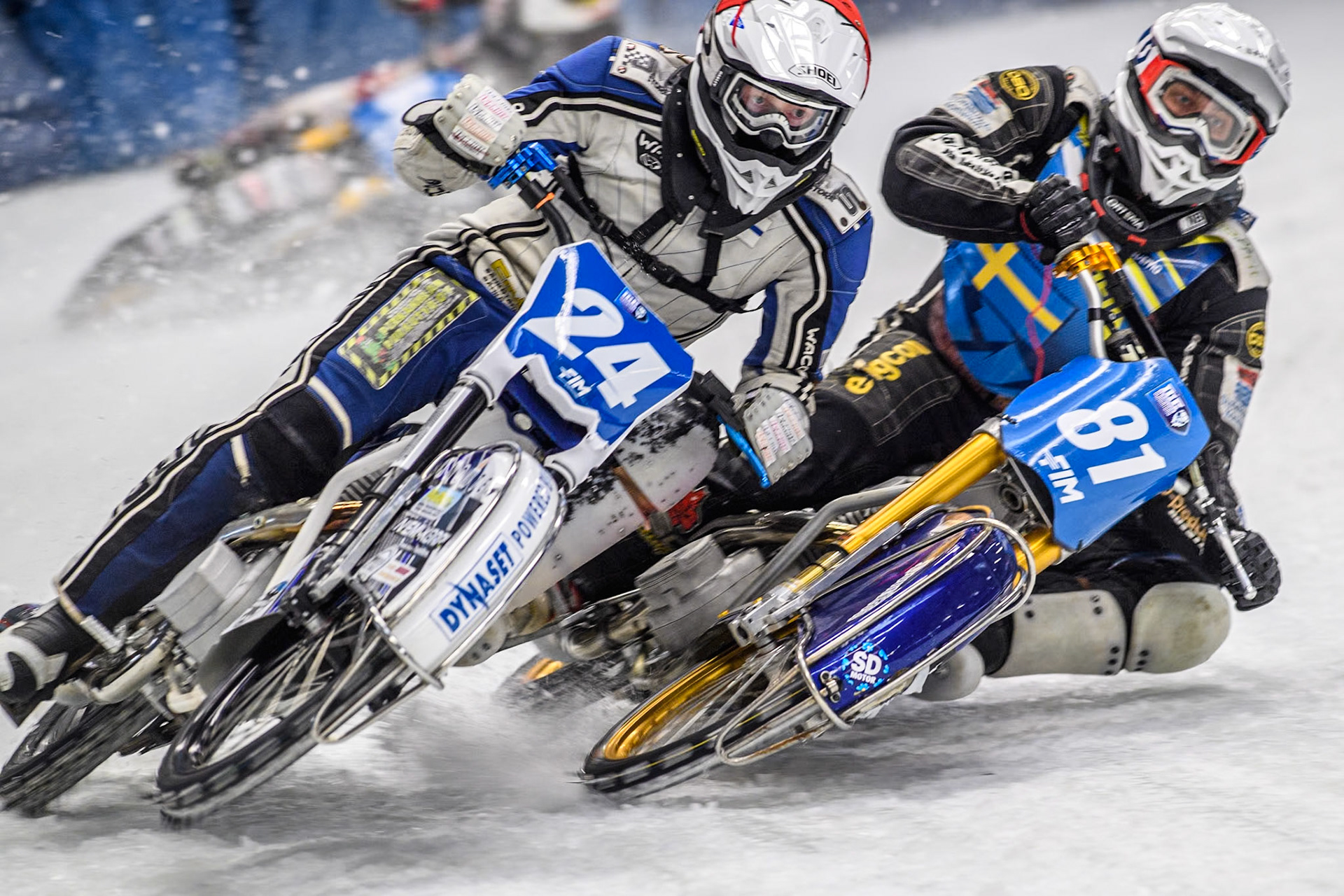 Finland's Max Koivula (24)  (Red) and Sweden"s Jimmy Olsén (81) (White) get up close and personal during the FIM Ice Speedway Gladiators World Championship Final 2 at the Max-Aicher-Arena, Inzell on Sunday 24 March 2024. (Photo: Ian Charles | MI News)