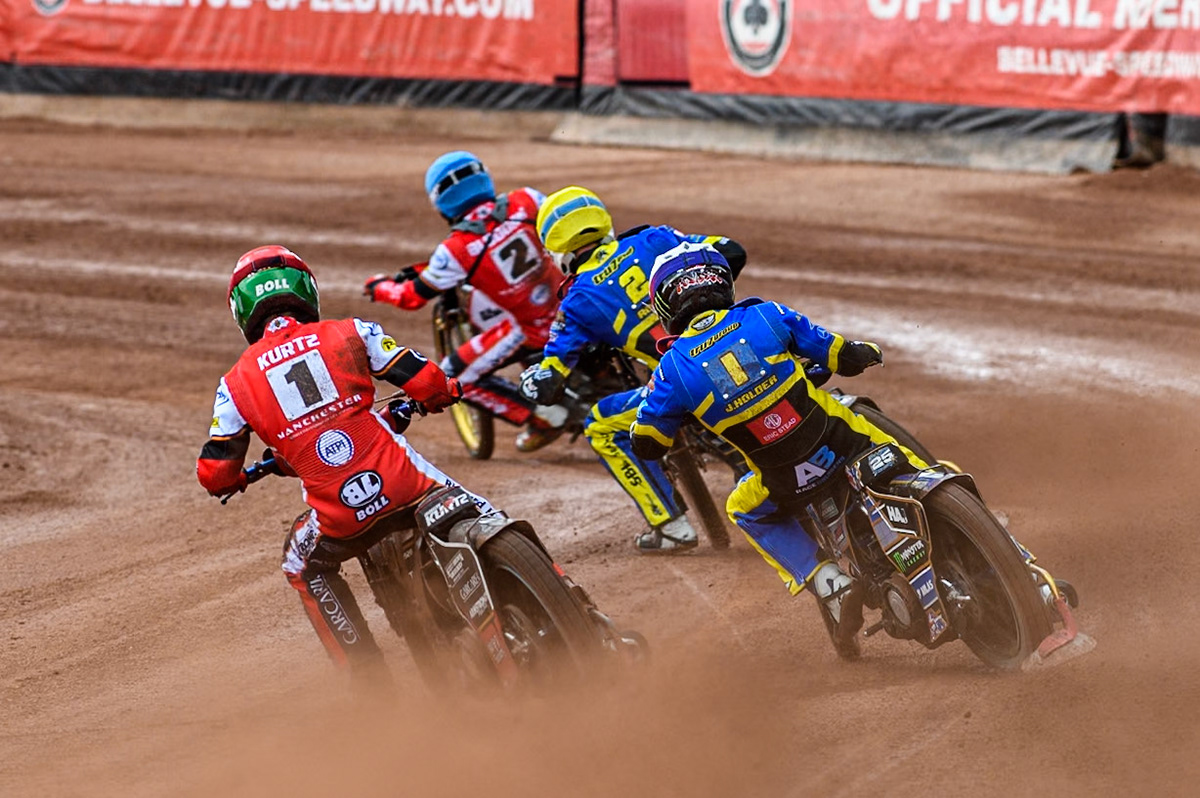 Brady Kurtz of Belle Vue Aces in Red chases Jack Holder of Sheffield Tigers in White, Anders Rowe of Sheffield Tigers in Yellow and Norick Blödorn of Belle Vue Aces in Blue during the Rowe Motor Oil Premiership match between Belle Vue Aces and Sheffield Tigers at the National Speedway Stadium, Manchester on Monday 5th May 2025. (Photo: Ian Charles | MI News)