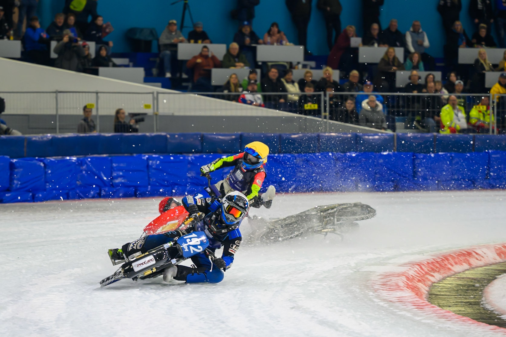 Heikki Huusko (67) of Finland  collides with Wild Card Harald Simon (16) of Austria in Yellow in the first turn during the FIM Ice Speedway Gladiators World Championship Final 3 at Ice Rink Thialf, Heerenveen on Saturday 11th April 2026. (Photo: Ian Charles | MI News)
