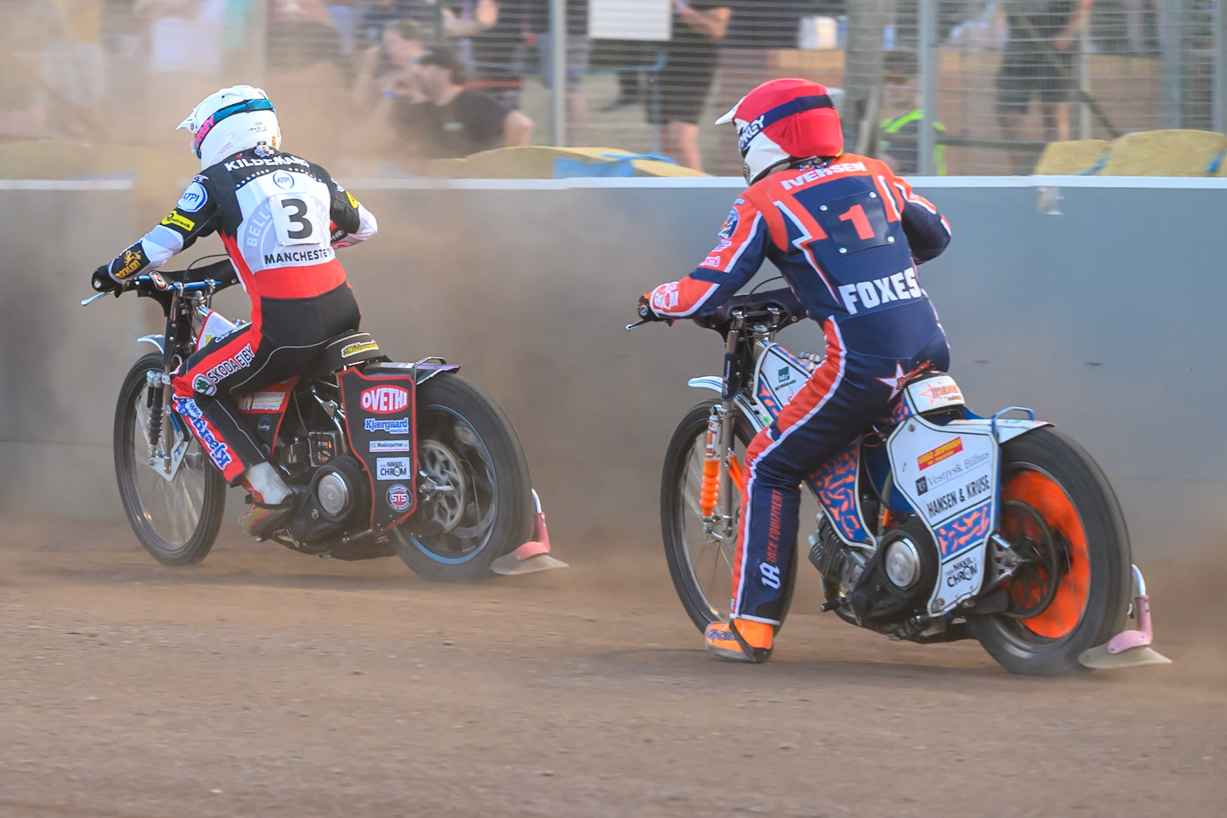 Niels-Kristian Iversen of Northampton Foxes  in Red chases Peter Kildemand of Belle Vue Aces  in White during the Rowe Motor Oil Premiership match between Northampton Foxes and Belle Vue Aces at Northampton International Shaleway, Northampton on Thursday 13th August 2026. (Photo: Ian Charles | MI News)