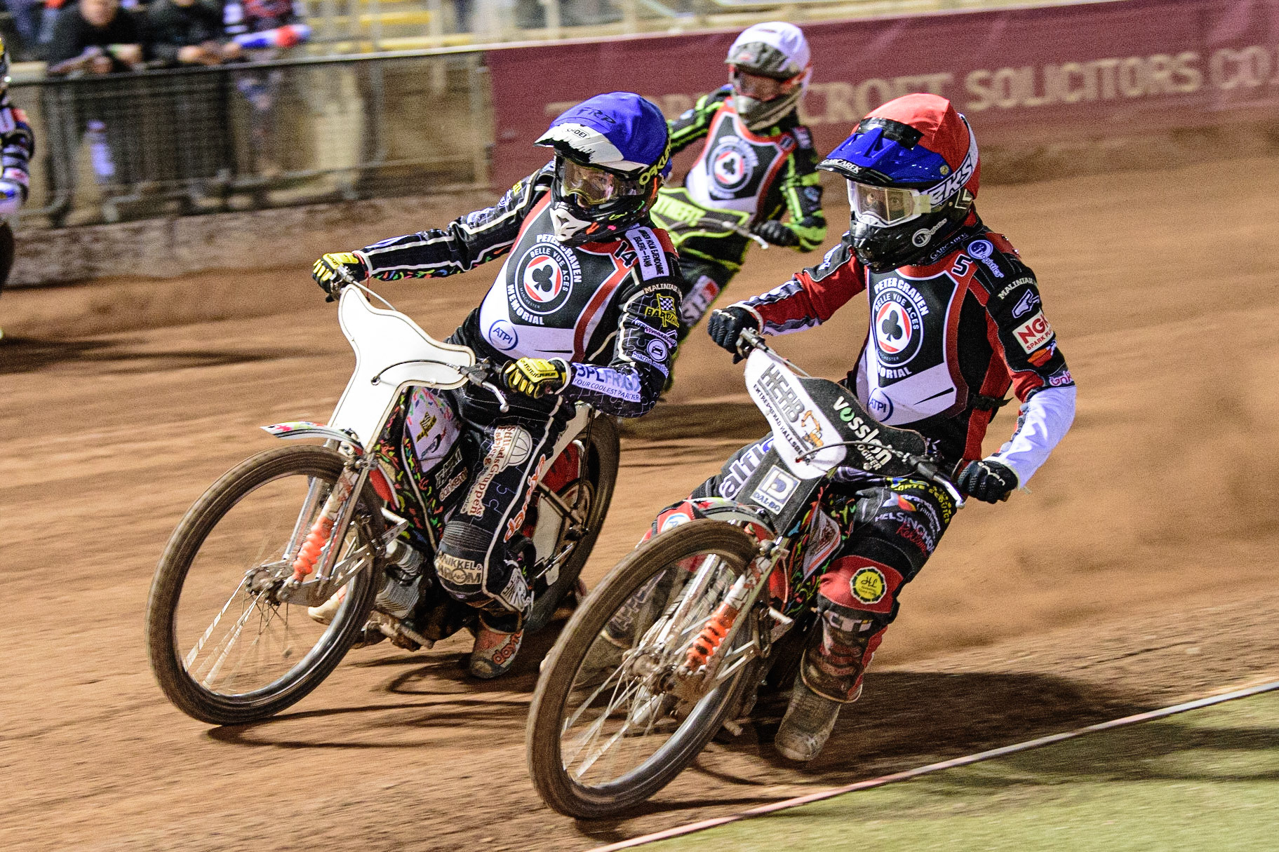 MANCHESTER, UK. MAR 21ST. Nicolai Klindt (Red) inside Niels-Kristian Iversen (Blue) with Jye Etheridge  (White) behind  during the ATPI Peter Craven Memorial Trophy at the National Speedway Stadium, Manchester on Monday 21st March 2022. (Credit: Ian Charles | MI News)