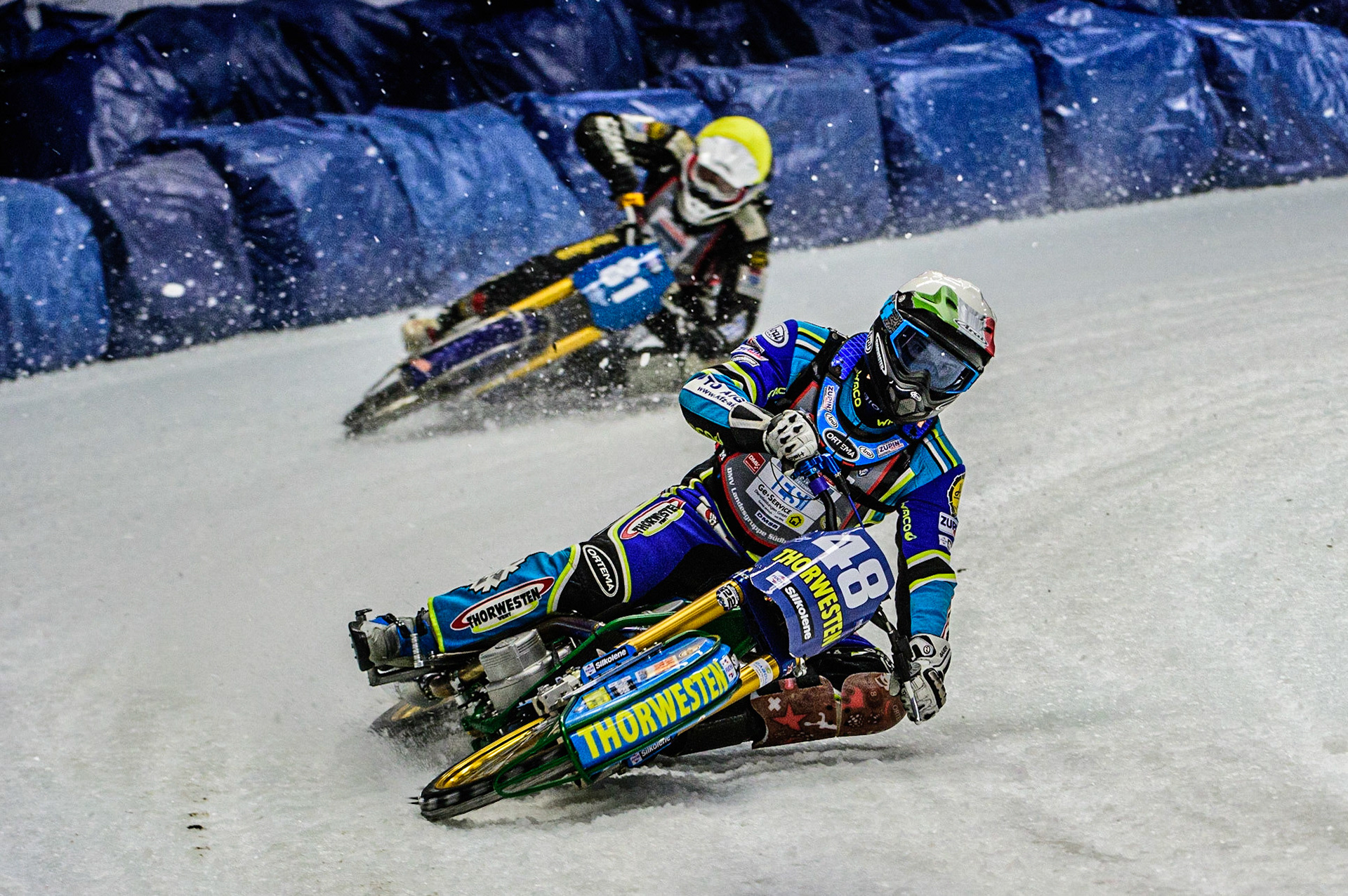 Luca Bauer (48) (White) leads Jimmy Olsen (81) (Yellow) during the Ice Speedway Gladiators World Championship Final 1 at Max-Aicher-Arena, Inzell, Germany on Saturday 18th March 2023. (Photo: Ian Charles | MI News)