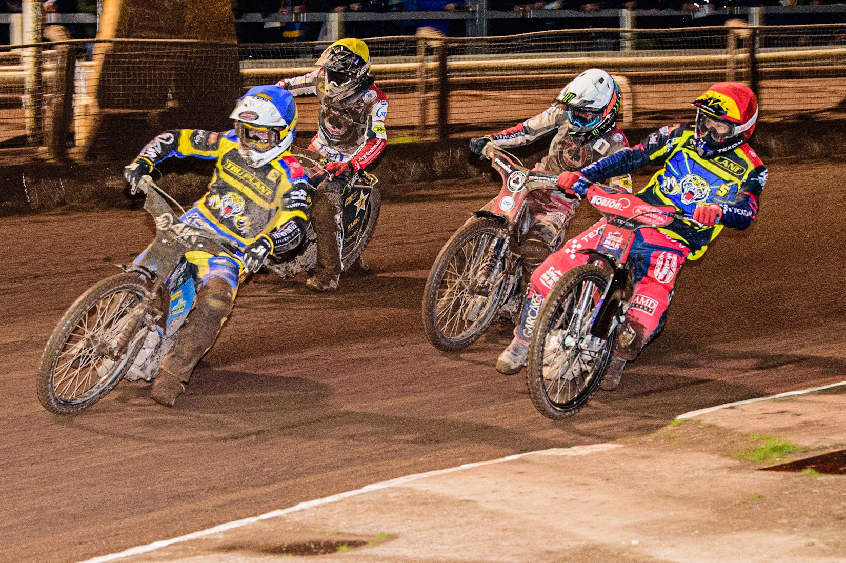 Lewis Kerr  (Blue) leads Tobiasz Musielak  (Red), Dan Bewley  (White) and Norick Blodorn  (Yellow) during the Sheffield Tigers vs Belle Vue Aces meeting in the SGP Premiership at Owlerton Stadium, Sheffield on Thursday 23rd March 2023. (Photo: Ian Charles | MI News)