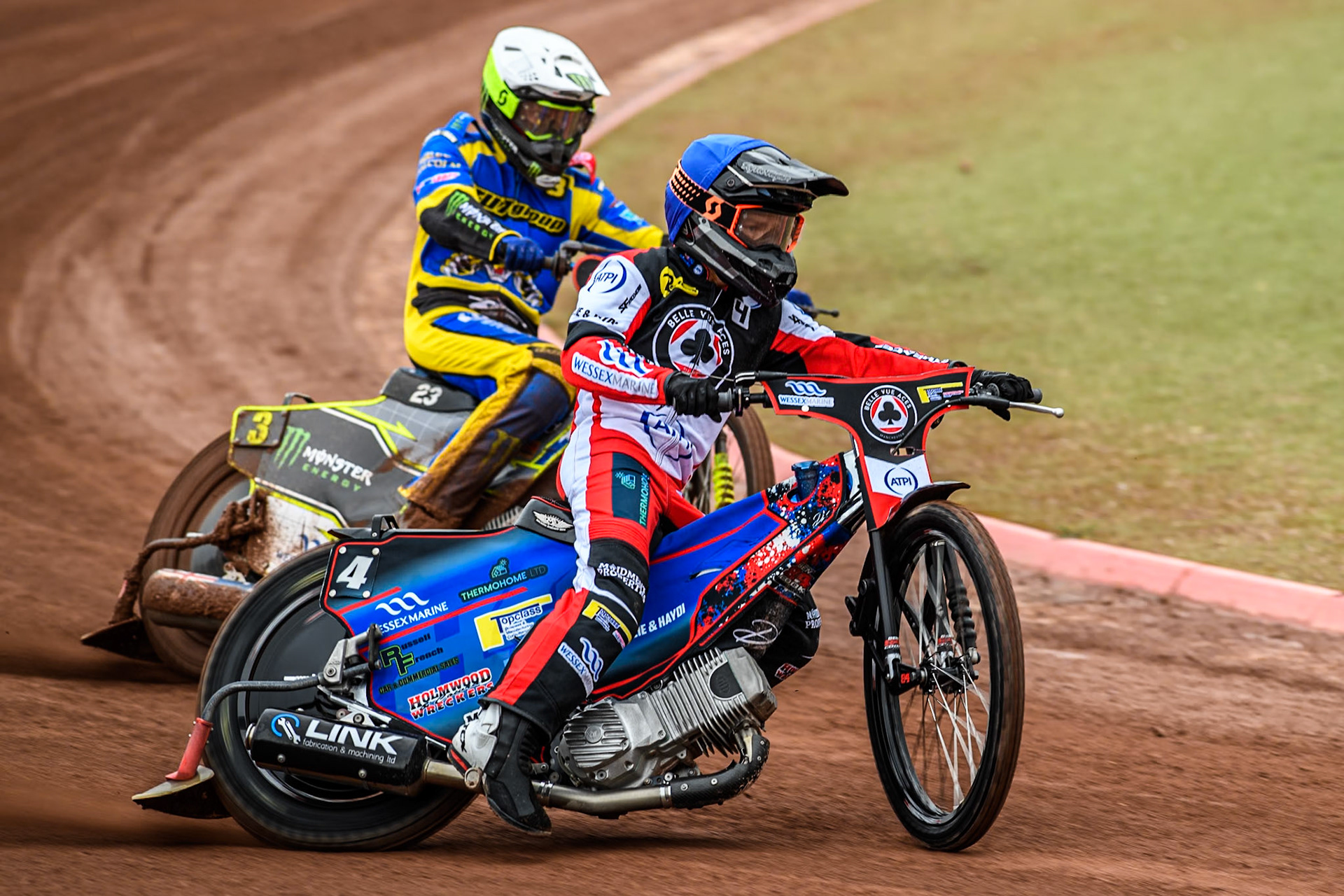 Belle Vue ATPI Aces Ben Cook (Blue) leads  Sheffield Tigers' Chris Holder (White) during the Rowe Motor Oil Premiership KO Cup Quarter Final 1st Leg between Belle Vue Aces and Sheffield Tigers at the National Speedway Stadium, Manchester on Monday 1st April 2024. (Photo: Ian Charles | MI News)