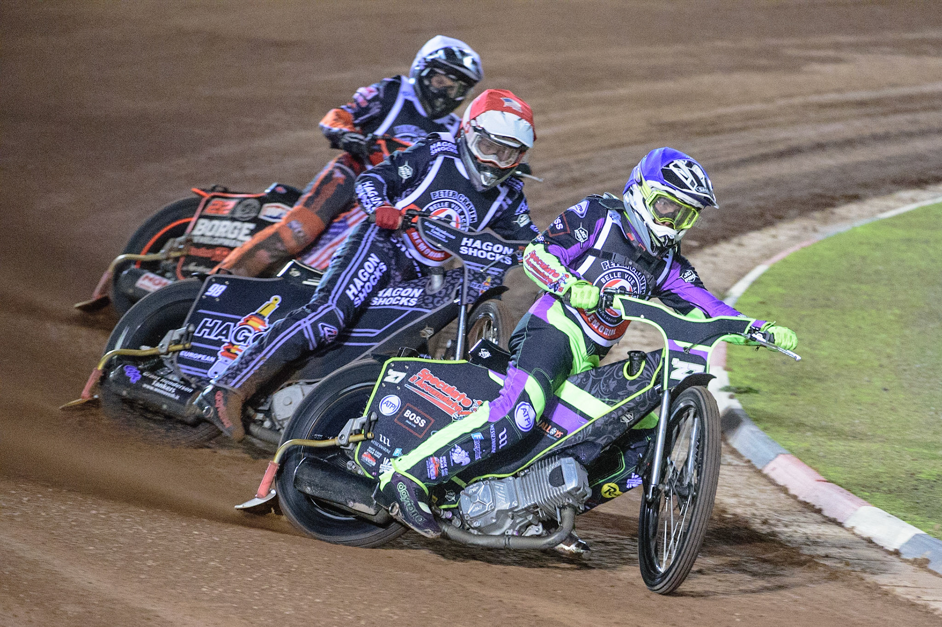 MANCHESTER, UK. OCT 23RD  Tom Brennan  (Blue) leads Broc Nicol  (Red) and Luke Becker  (White) during the Peter Craven Memorial Trophy event at the National Speedway Stadium, Manchester on Saturday 23rd October 2021. (Credit: Ian Charles | MI News)