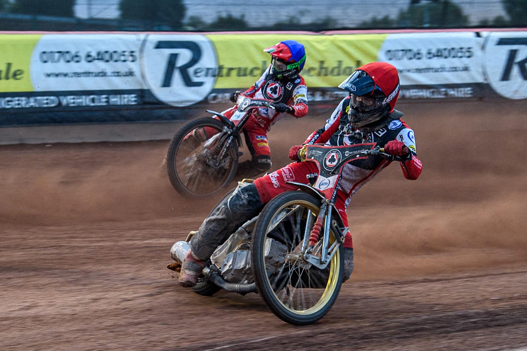 Belle Vue Aces' Norick Blodorn in Red rides inside team mate Belle Vue Aces' Dan Bewley in Blue during the Rowe Motor Oil Premiership match between Belle Vue Aces and Leicester Lions at the National Speedway Stadium, Manchester on Monday 24th June 2024. (Photo: Ian Charles | MI News)