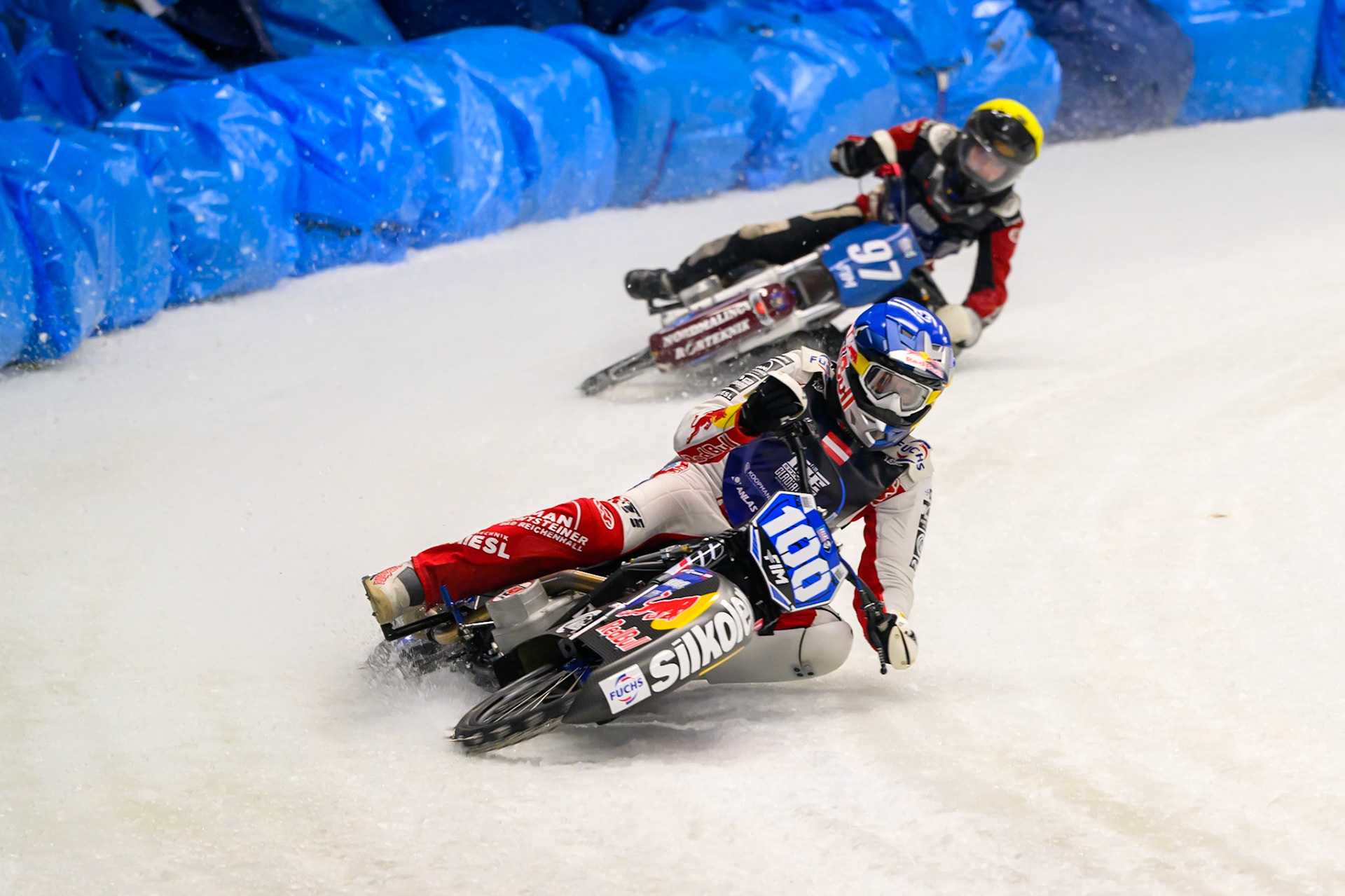 Franz Zorn (100) of Austria in Blue leading Ove Ledström (97) of Sweden in Yellow during the Ice Speedway Gladiators World Championship Final 2 at Max-Aicher-Arena, Inzell on Sunday 15th March 2026. (Photo: Ian Charles | MI News)