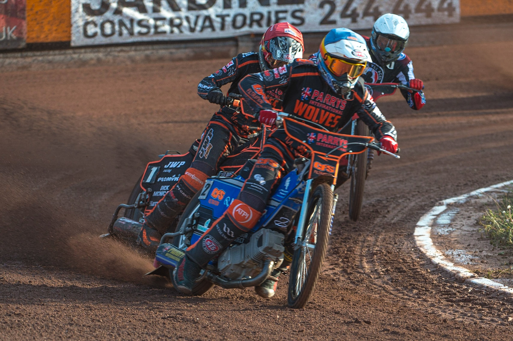 WOLVERHAMPTON, UK. JUN 20TH Steve Worrall  (Blue) leads Sam Masters  (Red) and Matej Zagar   (White) during the SGB Premiership match between Wolverhampton Wolves and Belle Vue Aces at Monmore Green Stadium, Wolverhampton on Monday 20th June 2022. (Credit: Ian Charles | MI News)