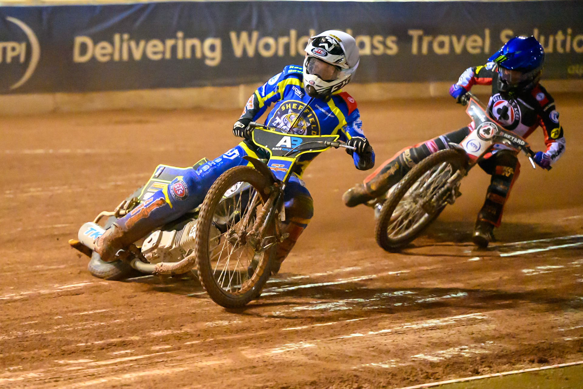 Jye Etheridge of Sheffield Tigers    in White leading Dan Bewley of Belle Vue Aces   in Blue during the Knockout Cup, Northern Section match between Belle Vue Aces and Sheffield Tigers at the National Speedway Stadium, Manchester on Monday 30th March 2026. (Photo: Ian Charles | MI News)