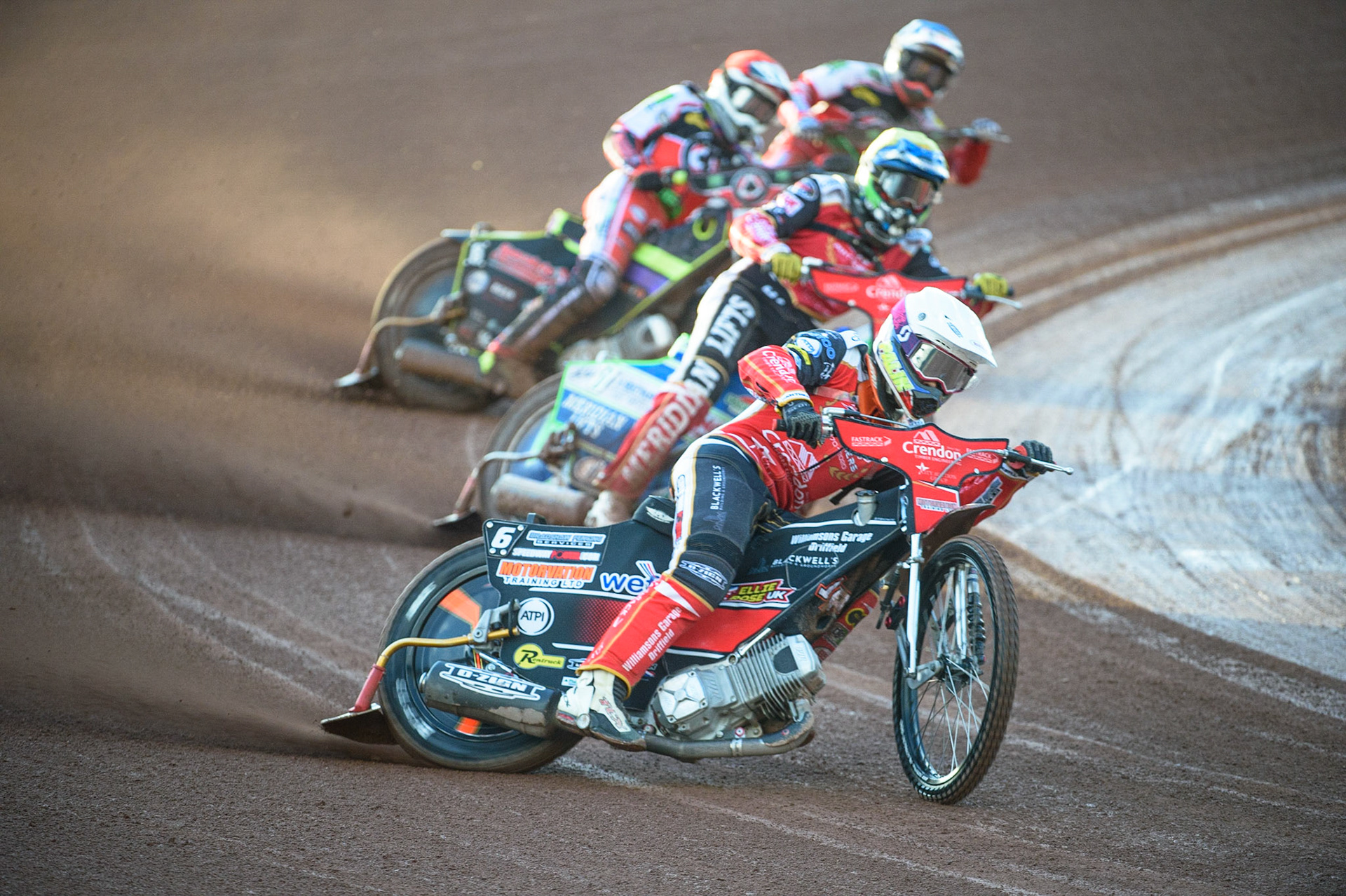 MANCHESTER, UK. AUG 9TH  Jordan Palin  (White) and Hans Andersen  (Yellow) lead Tom Brennan  (Red) and Ricky Wells  (Blue) during the SGB Premiership match between Belle Vue Aces and Peterborough at the National Speedway Stadium, Manchester on Monday 9th August 2021. (Credit: Ian Charles | MI News)