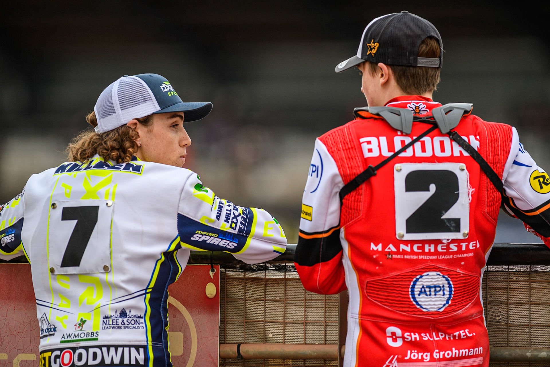 Oxford Spires' Luke Killeen (Left) chats with Belle Vue Aces' Norick Blodorn during the Rowe Motor Oil Premiership match between Belle Vue Aces and Oxford Spires at the National Speedway Stadium, Manchester on Monday 14th April 2025. (Photo: Ian Charles | MI News)