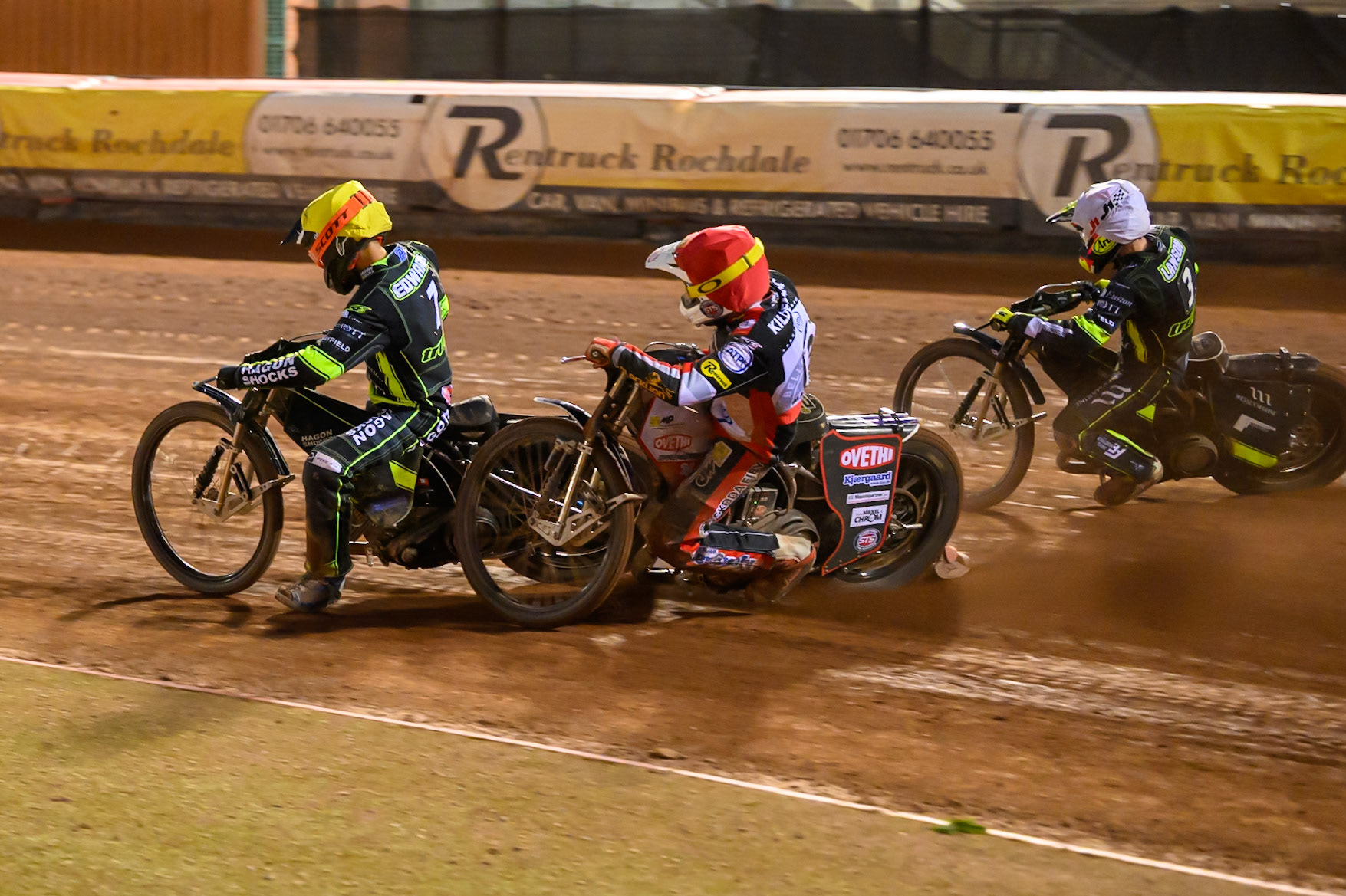 Peter Kildemand of Belle Vue Aces  in Red chases Jason Edwards of Ipswich Witches  in Yellow during the Rowe Motor Oil Premiership match between Belle Vue Aces and Ipswich Witches at the National Speedway Stadium, Manchester on Monday 20th April 2026. (Photo: Ian Charles | MI News)