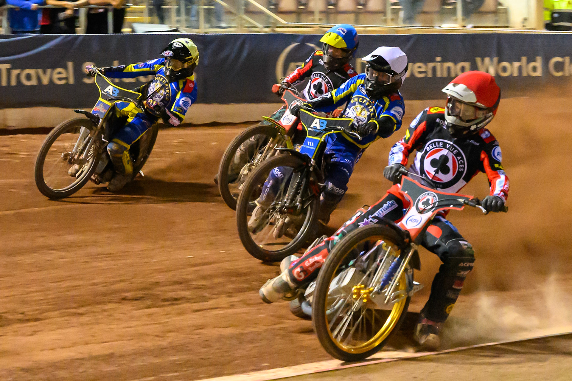 Heat 15 re-run: Jason Doyle of Belle Vue Aces in Red on the inside of Ben Cook, Guest Rider for Sheffield Tigers in White , Tate Zischke of Belle Vue Aces in Blue  and Josh Pickering of Sheffield Tigers in Yellow during the Rowe Motor Oil Premiership match between Belle Vue Aces and Sheffield Tigers at the National Speedway Stadium, Manchester on Monday 14th September 2026. (Photo: Ian Charles | MI News)