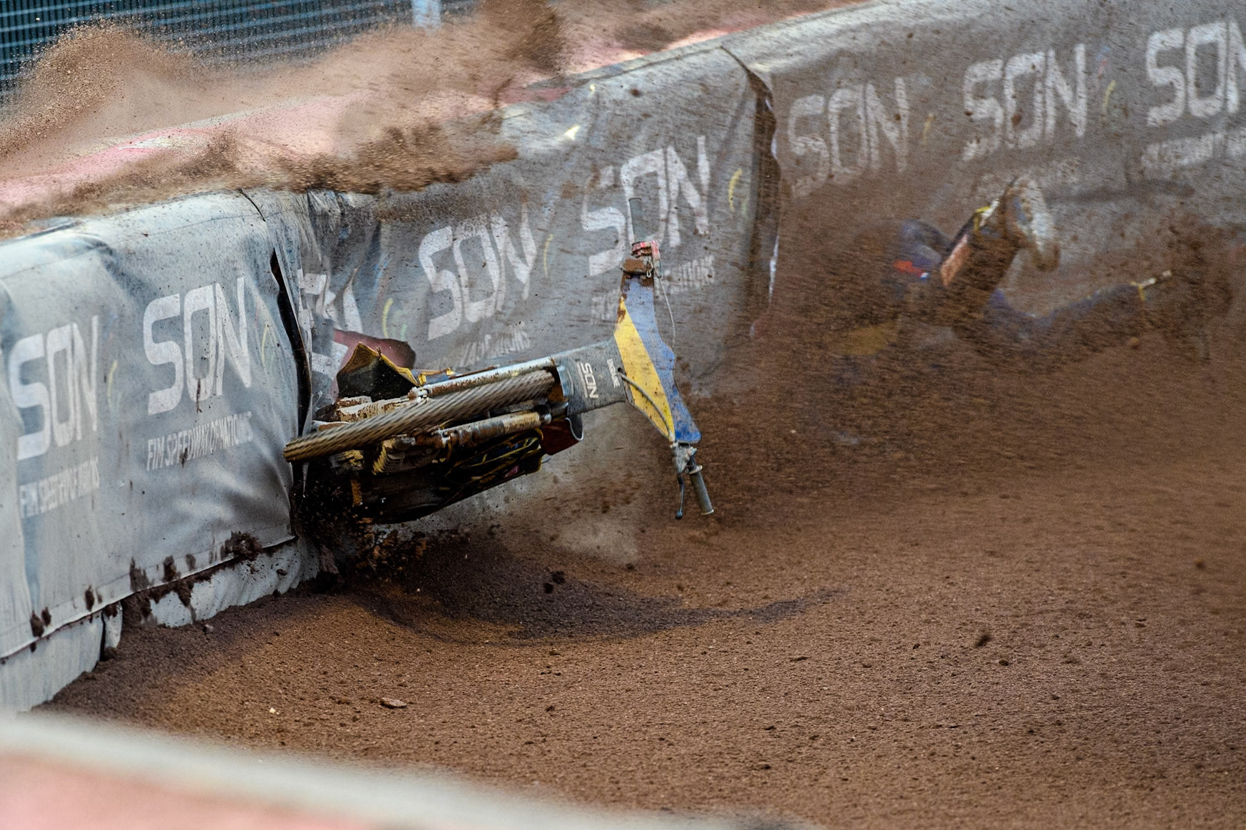 Marko Levishyn of Ukraine in Yellow crashes out of his final heat during the Monster Energy FIM Speedway of Nations Semi-Final 1 at the National Speedway Stadium, Manchester on Tuesday 9th July 2024. (Photo: Ian Charles | MI News)