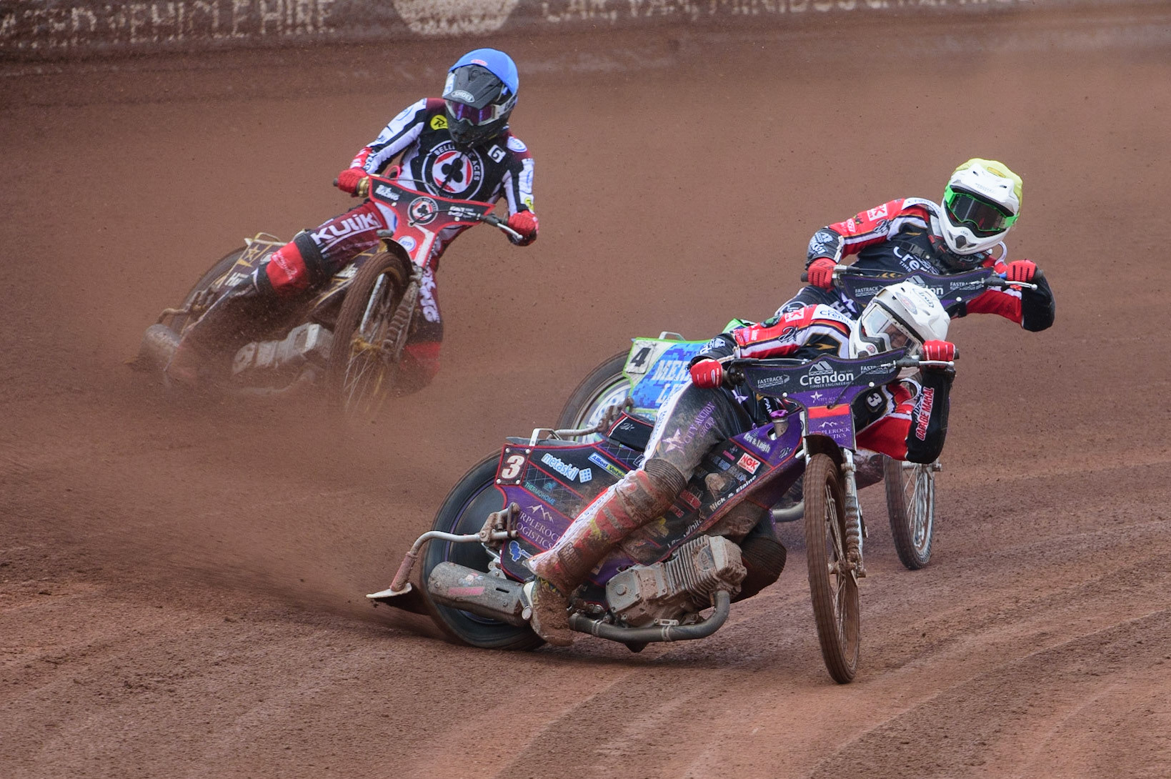 MANCHESTER, UK. MAY 2ND Ulrich Ostergaard  (White) and Hans Andersen   (Yellow) lead Norick Blödorn  (Blue) during the SGB Premiership match between Belle Vue Aces and Peterborough at the National Speedway Stadium, Manchester on Monday 2nd May 2022. (Credit: Ian Charles | MI News)