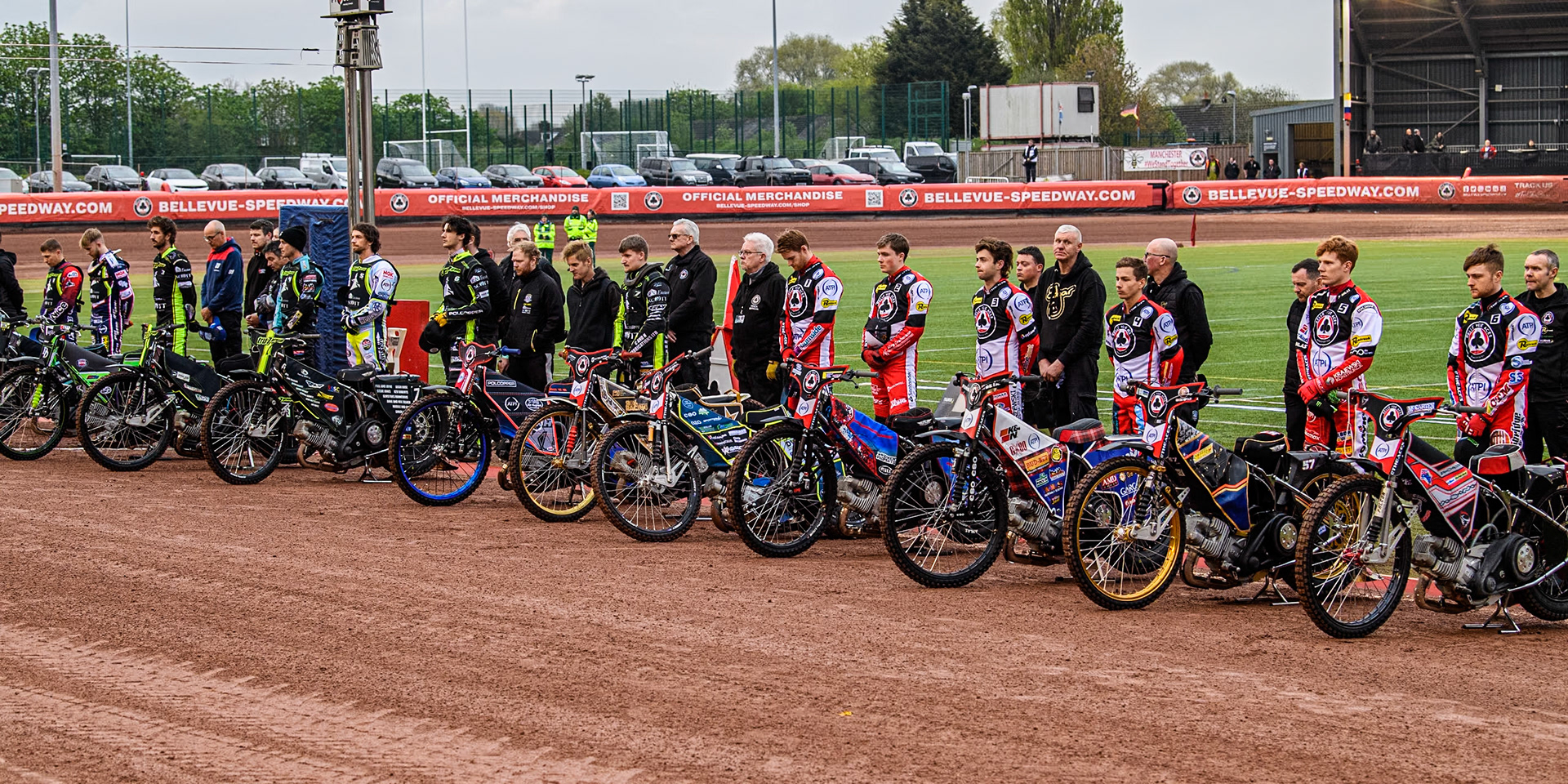 Both teams line up for the one minute’s silence in memory of  former Belle Vue Speedway announcer Ken Wrench during the Rowe Motor Oil Premiership match between Belle Vue Aces and Ipswich Witches at the National Speedway Stadium, Manchester on Monday 22nd April 2024. (Photo: Ian Charles | MI News)