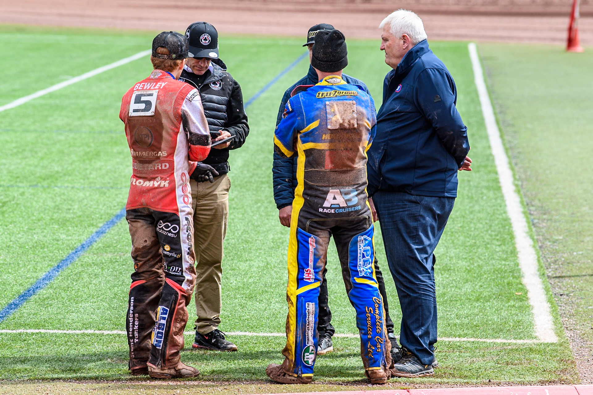 Belle Vue Aces' Dan Bewley (Left) joins the on track meeting with the referee during the Rowe Motor Oil Premiership match between Belle Vue Aces and Sheffield Tigers at the National Speedway Stadium, Manchester on Monday 27th May 2024. (Photo: Ian Charles | MI News)