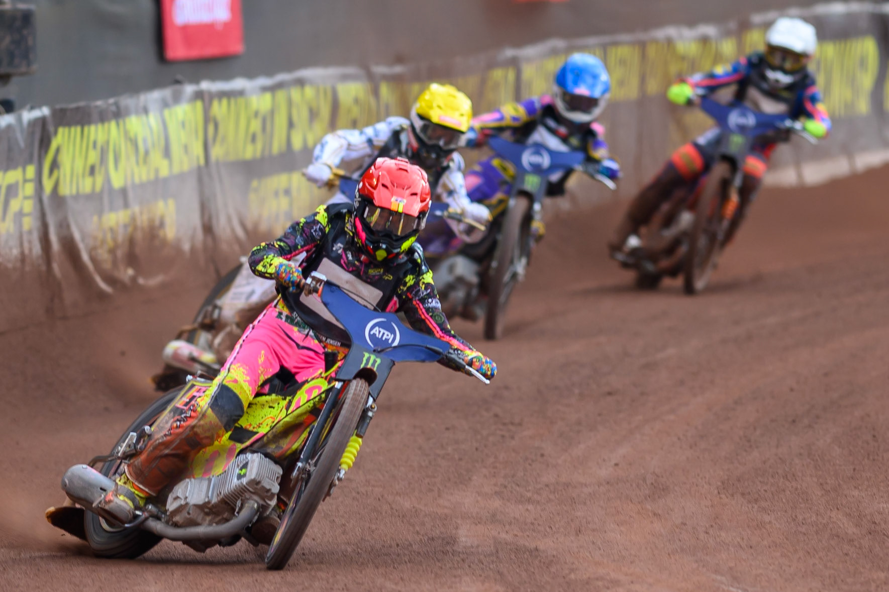 Michael Jepsen Jensen (52) of Denmark in Red leading Anders Thomsen (105) of Denmark in Yellow, Kacper Woryna (223) of Poland in Blue and Andzejs Lebedevs (29) of Latvia in White during the ATPI  FIM Speedway GP of Manchester at the National Speedway Stadium, Manchester on Saturday 6th June 2026. (Photo: Ian Charles | MI News)