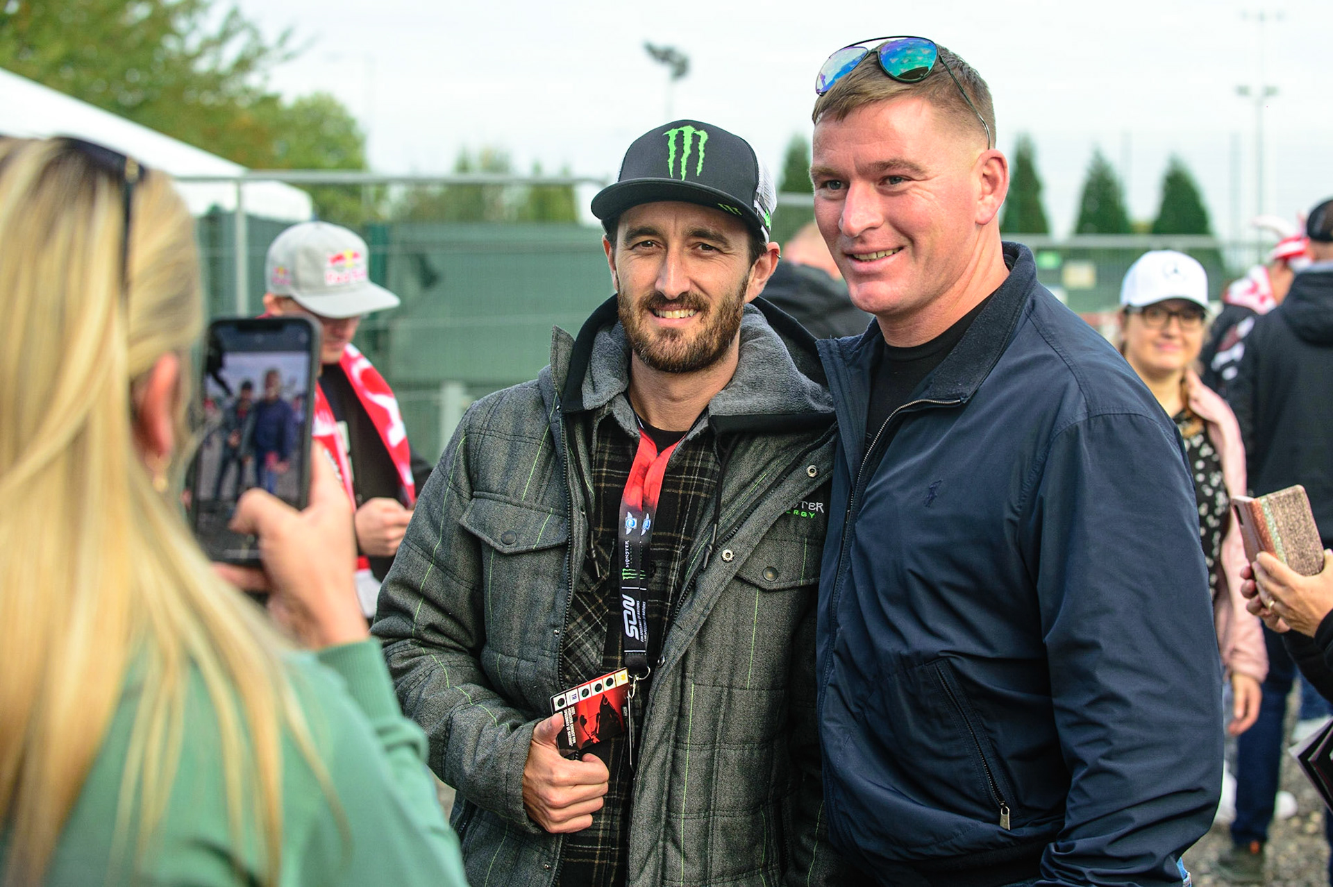 MANCHESTER, UK. OCT 16TH Aussie rider Chris Holder (in the monster cap) poses for a photo with some fans during the Monster Energy FIM Speedway of Nations at the National Speedway Stadium, Manchester on Saturday  16th October 2021. (Credit: Ian Charles | MI News)