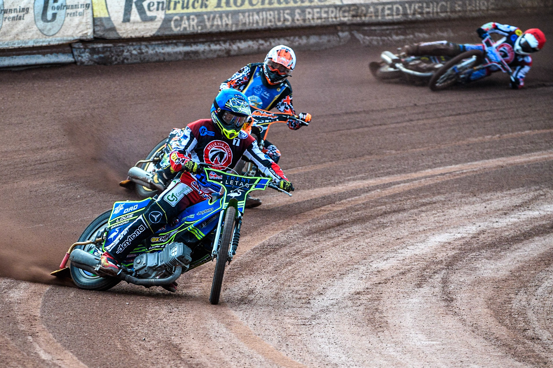 Luke Muff (Blue) leads Mickie Simpson (White) as Paul Bowen (Red) slides off behind during the National Development League match between Belle Vue Colts and Edinburgh Monarchs Academy at the National Speedway Stadium, Manchester on Friday 21st July 2023. (Photo: Ian Charles | MI News)