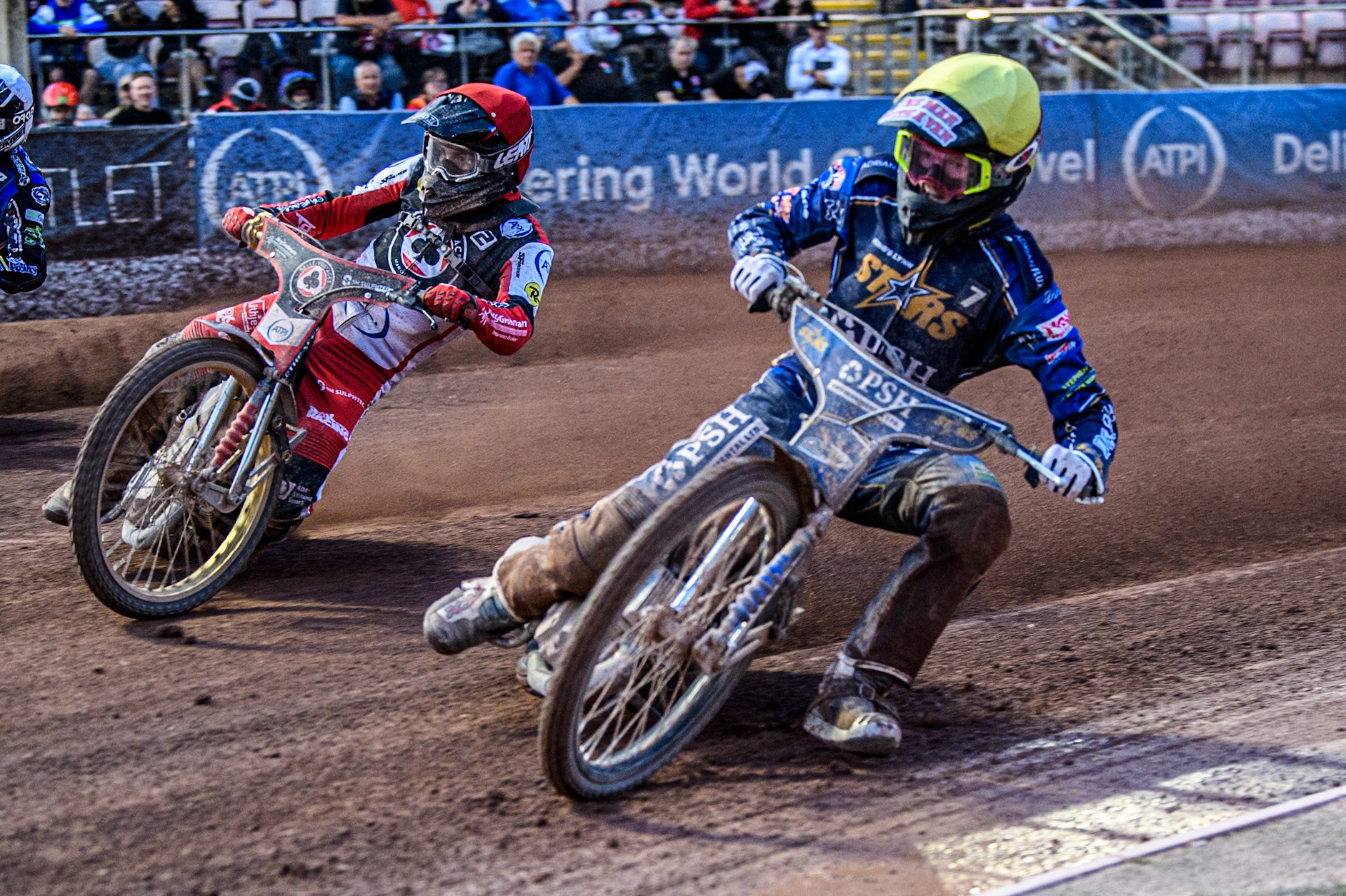 Kings Lynn Stars' Anders Rowe during the Rowe Motor Oil Premiership match between Belle Vue Aces and King's Lynn Stars at the National Speedway in Yellow rides inside Belle Vue Aces' Norick Blodorn  in Red Stadium, Manchester on Monday 12th August 2024. (Photo: Ian Charles | MI News)