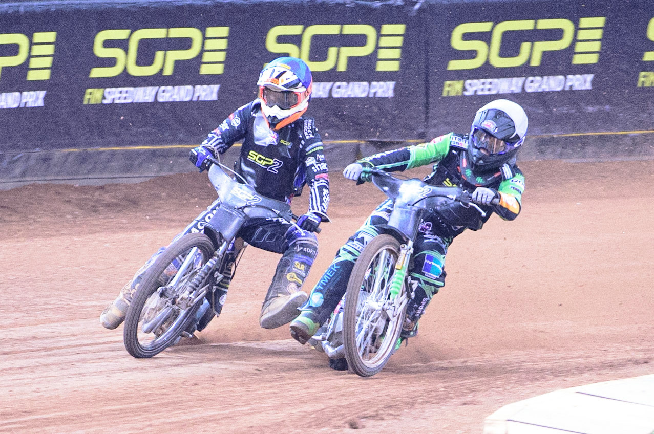 Benjamin Basso (Denmark)  (White) shoves Jason Edwards (Great Britain) (Blue) during the FIM  Speedway Grand Prix  2 of Great Britain at the Principality Stadium, Cardiff on Sunday 14th August 2022. (Credit: Ian Charles | MI News)