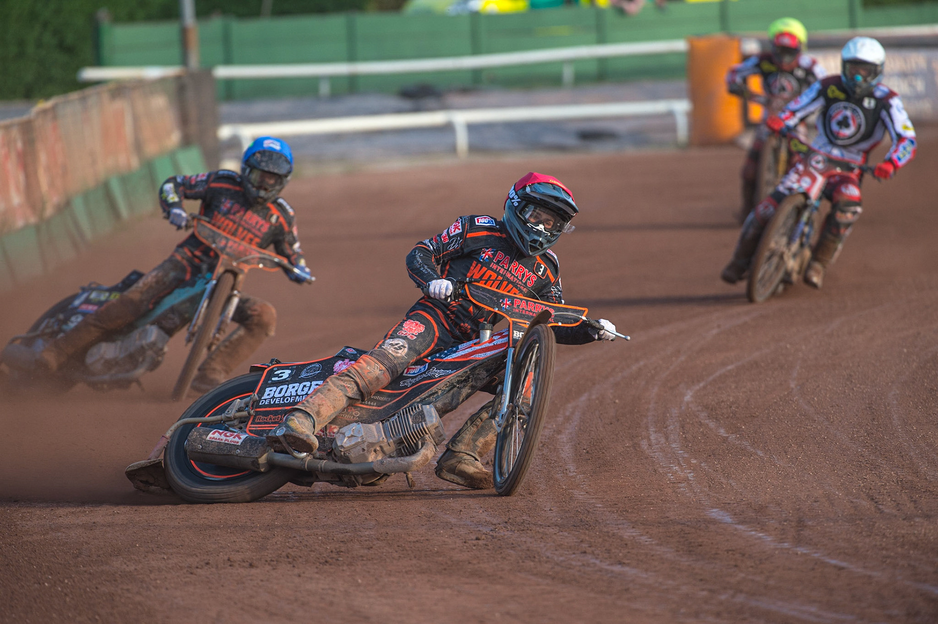 WOLVERHAMPTON, UK. JUN 20TH Luke Bekker  (Red) and Ryan Douglas (Blue) lead Matej Zagar   (White)  and Jye Etheridge  (Yellow) during the SGB Premiership match between Wolverhampton Wolves and Belle Vue Aces at Monmore Green Stadium, Wolverhampton on Monday 20th June 2022. (Credit: Ian Charles | MI News)