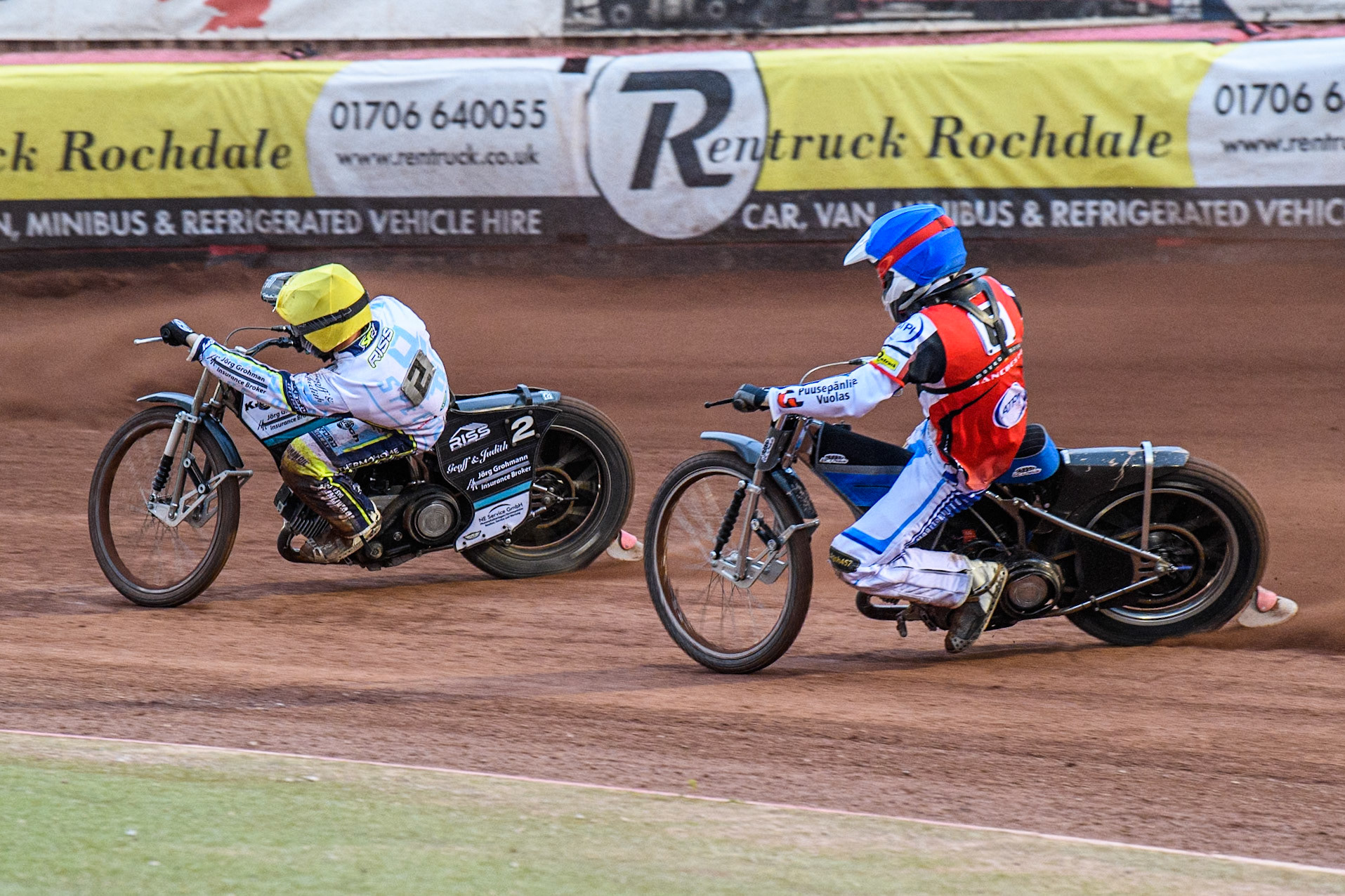 Belle Vue Aces' guest Antti Vuolas  in Blue chases Oxford Spires' Erik Riss in Yellow during the Rowe Motor Oil Premiership match between Belle Vue Aces and Oxford Spires at the National Speedway Stadium, Manchester on Monday 22nd July 2024. (Photo: Ian Charles | MI News)