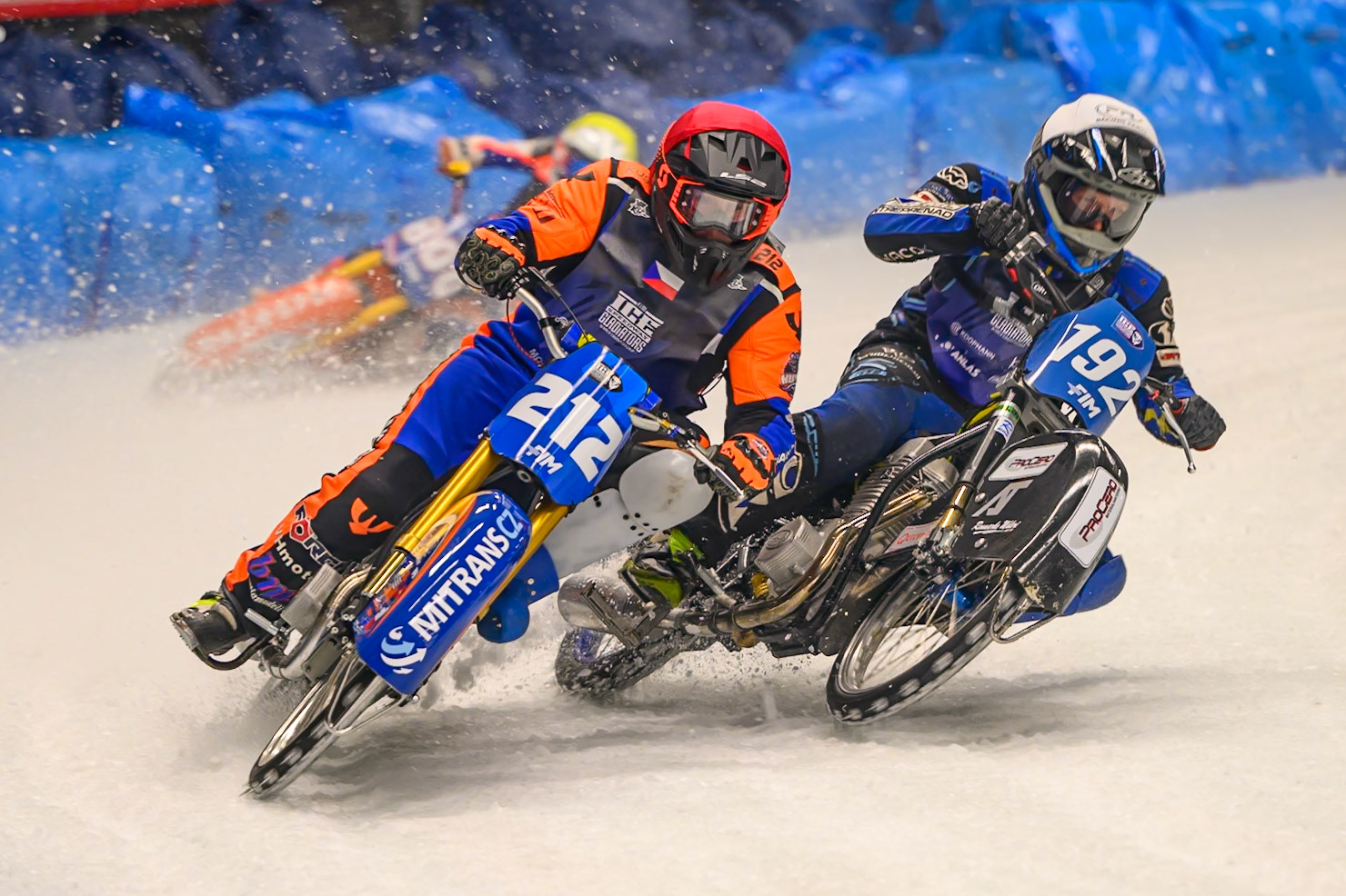 Niclas Svensson (192) of Sweden  in White shoves Lukas Hutla (212) of Czechia in Red out to pass him with Johann Weber (33) of Germany  in Blue on the outside during the Ice Speedway Gladiators World Championship Final 1 at Max-Aicher-Arena, Inzell on Saturday 14th March 2026. (Photo: Ian Charles | MI News)
