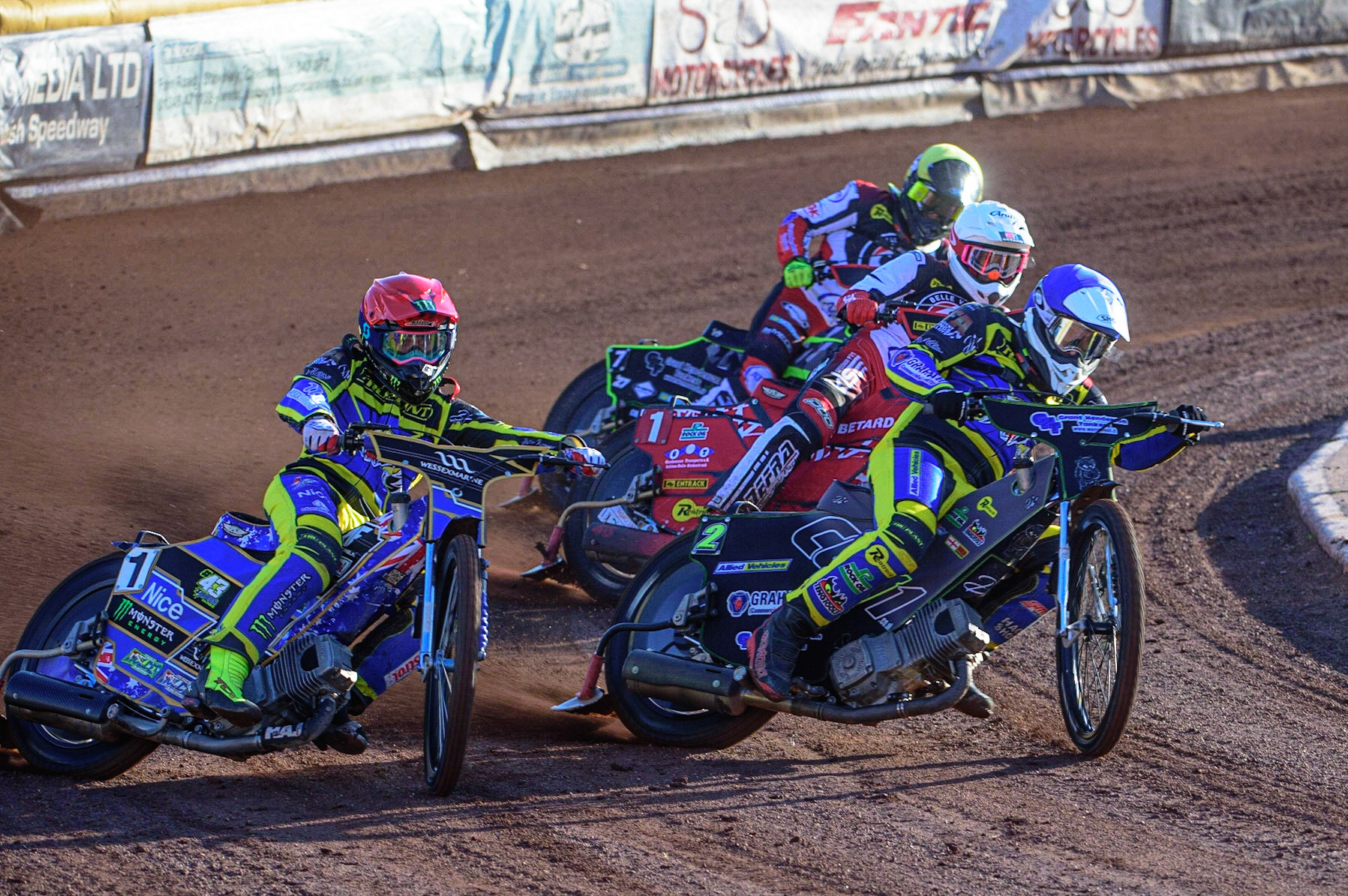 SHEFFIELD, UK. MAY 26TH  Jack Holder (Red) and Craig Cook (Blue) lead Max Fricke  (White) and Tom Brennan  (Yellow) during the SGB Premiership match between Sheffield Tigers and Belle Vue Aces at Owlerton Stadium, Sheffield on Thursday 26th May 2022. (Credit: Ian Charles | MI News)
