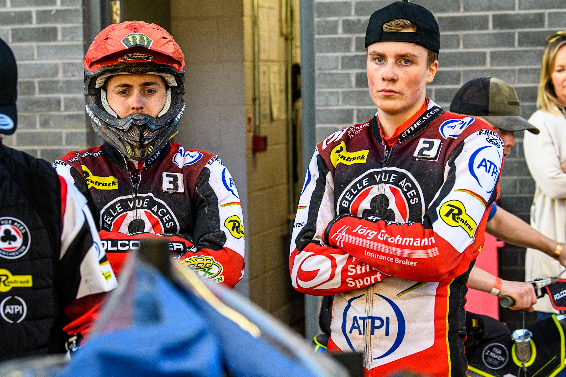 Jaimon Lidsey (left) and Norick Blodorn watch the TV monitor during the Sports Insure Premiership match between Belle Vue Aces and Ipswich Witches at the National Speedway Stadium, Manchester on Monday 17th July 2023. (Photo: Ian Charles | MI News)