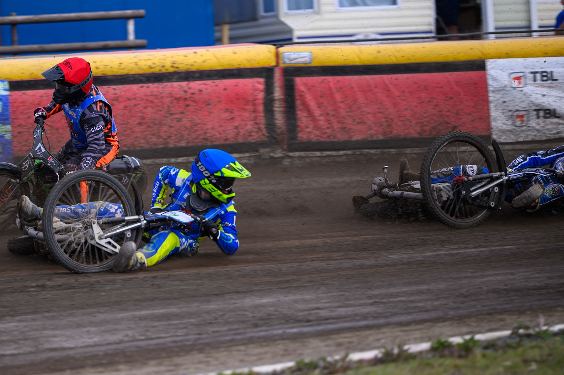 Will Boraston of Buxton Bulls in Yellow falls in the path of Ollie Binns of Kings Lynn Young Stars during the WSRA National Development League match between Buxton Bulls and King's Lynn Young Stars at Hi-Edge Speedway, Buxton on Sunday 9th August 2026. (Photo: Ian Charles | MI News)