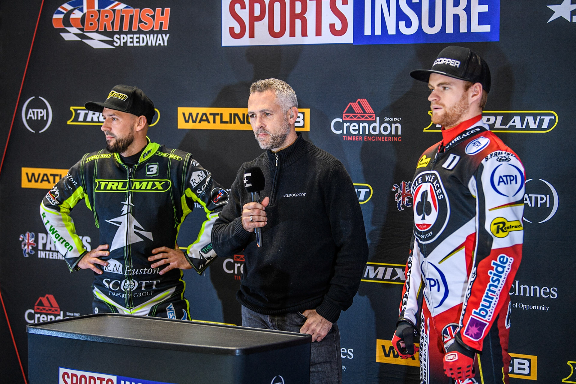 Eurosport presenter Scott Nicholls (Centre) prepares to interview the team Captains Danny King (Left) and Brady Kurtz (Right) during the Sports Insure Premiership Semi Final Playoff 2nd leg match between Belle Vue Aces and Ipswich Witches at the National Speedway Stadium, Manchester on Monday 25th September 2023. (Photo: Ian Charles | MI News)