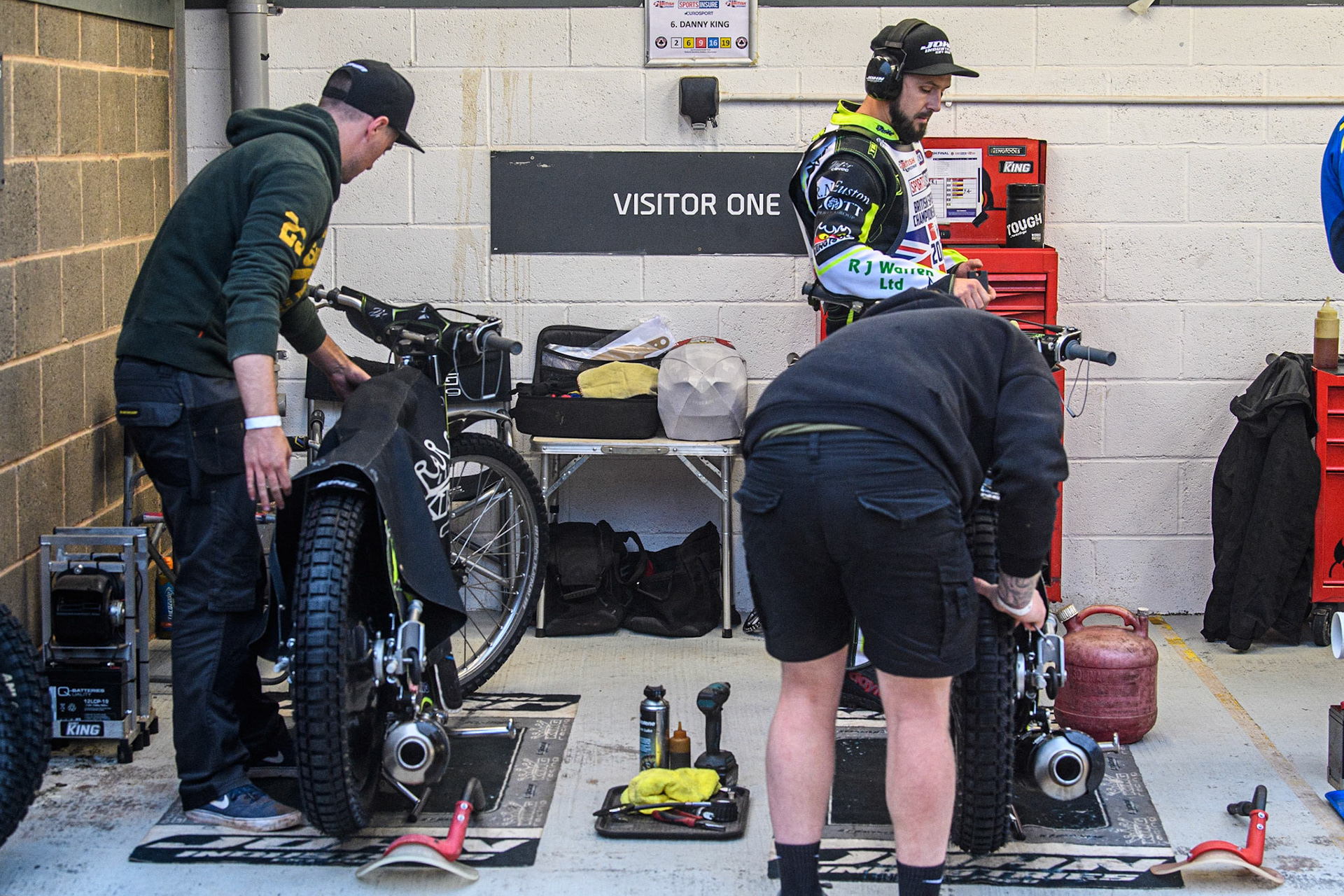 Danny King’s team work on his bikes during the Sports Insure British Speedway Final at the National Speedway Stadium, Manchester on Monday 14th August 2023. (Photo: Ian Charles | MI News)
