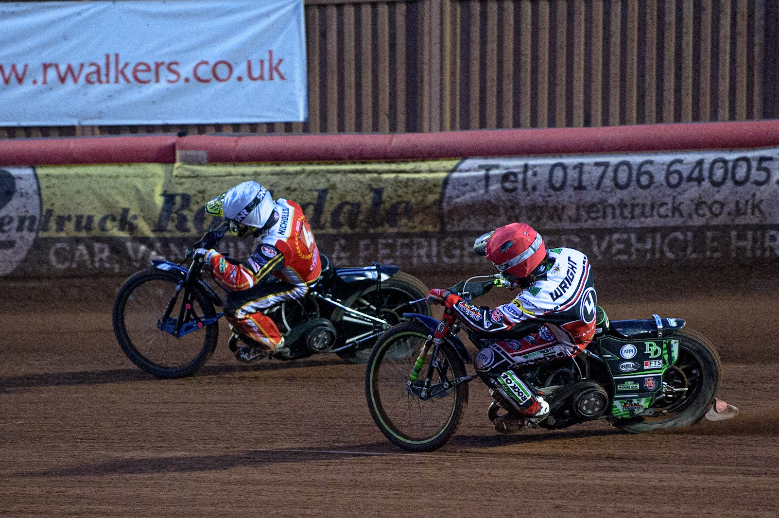 MANCHESTER, UK. AUG 9TH Charles Wright  (Red) chases’ Scott Nicholls  (White)  during the SGB Premiership match between Belle Vue Aces and Peterborough at the National Speedway Stadium, Manchester on Monday 9th August 2021. (Credit: Ian Charles | MI News)