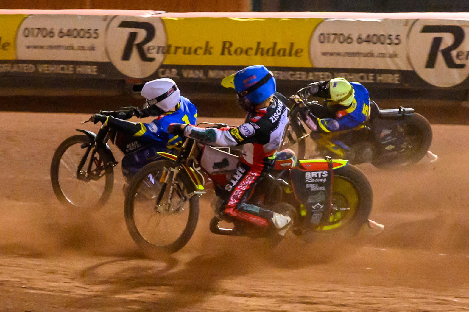 Tate Zischke of Belle Vue Aces in Blue chases Ben Cook, Guest Rider for Sheffield Tigers in White  and Josh Pickering of Sheffield Tigers in Yellow during the Rowe Motor Oil Premiership match between Belle Vue Aces and Sheffield Tigers at the National Speedway Stadium, Manchester on Monday 14th September 2026. (Photo: Ian Charles | MI News)
