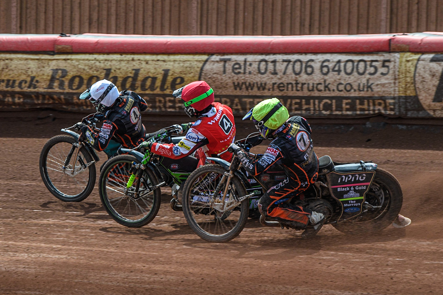 Charles Wright (Red) rides between Ryan Douglas (White) and Leon Flint (Yellow) during the Sports Insure Premiership match between Belle Vue Aces and Wolverhampton Wolves at the National Speedway Stadium, Manchester on Monday 29th May 2023. (Photo: Ian Charles | MI News)