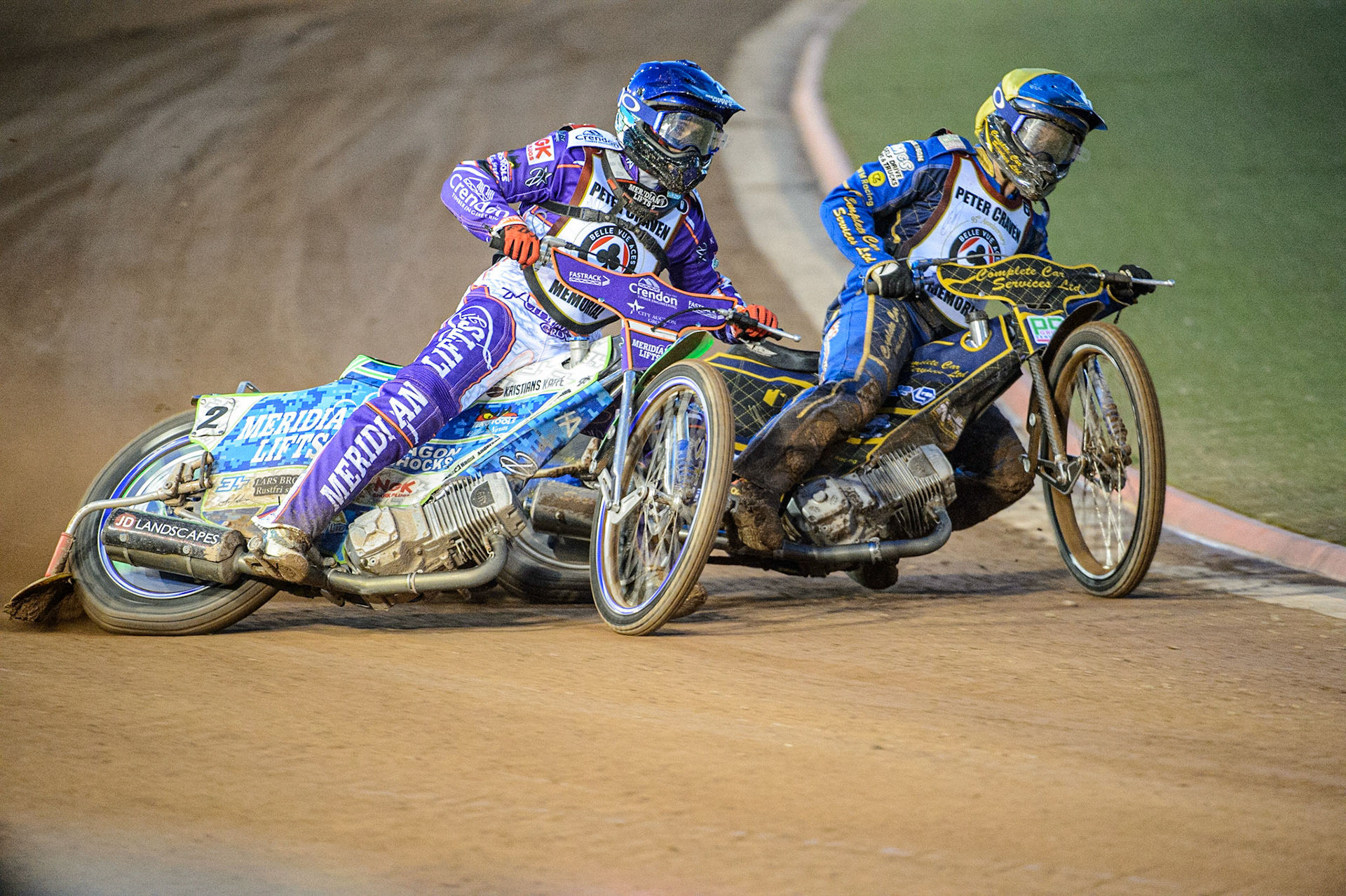 Hans Andersen  (Blue) battles with Kyle Howarth  (Yellow) during the Peter Craven Memorial Trophy  at the National Speedway Stadium, Manchester on Monday 3rd April 2023. (Photo: Ian Charles | MI News)