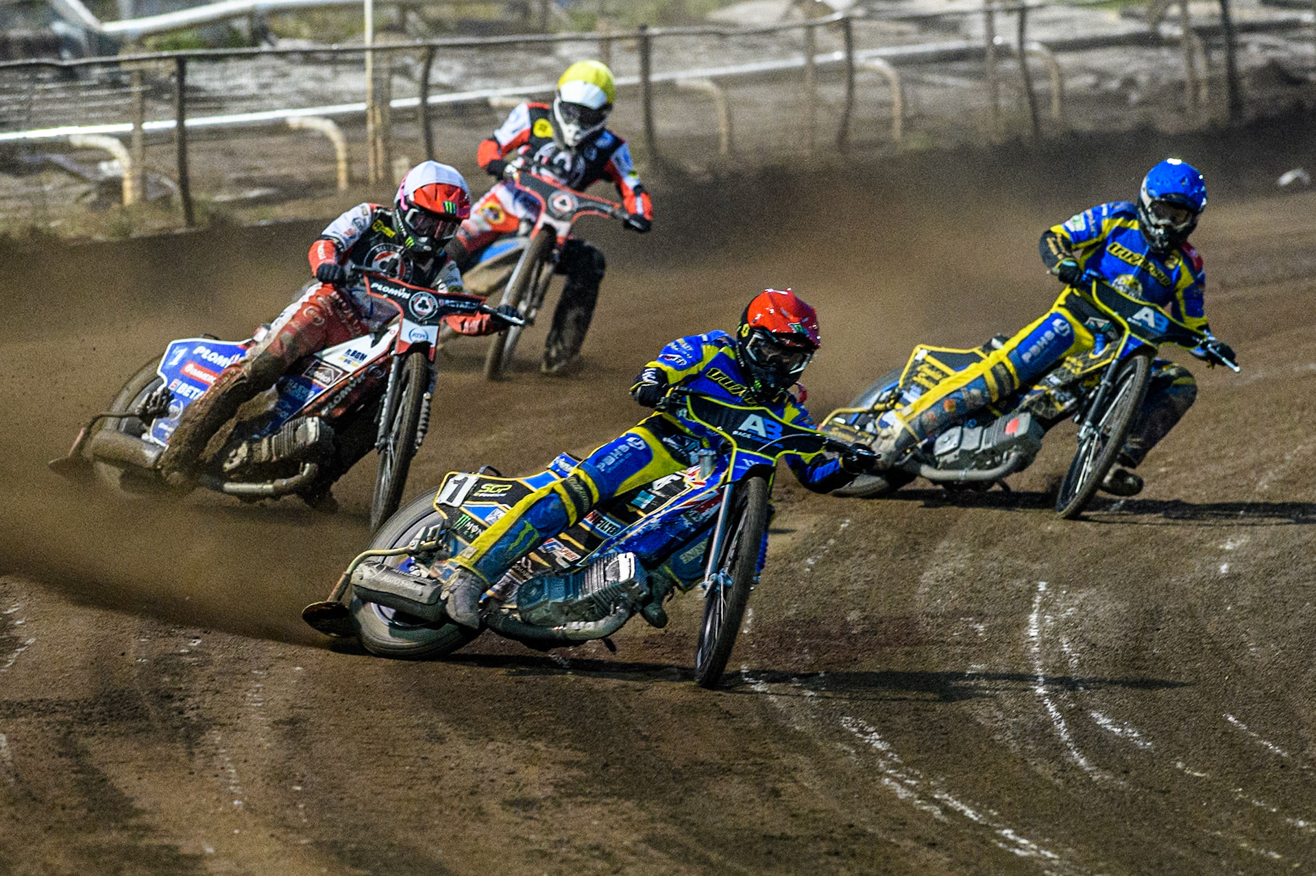 Sheffield Tigers' Jack Holder  in Red leading Belle Vue Aces' Dan Bewley   in White Sheffield Tigers' Kyle Howarth  in Blue and Belle Vue Aces' Antti Vuolas  in Yellow during the Rowe Motor Oil Premiership match between Sheffield Tigers and Belle Vue Aces at Owlerton Stadium, Sheffield on Monday 26th August 2024. (Photo: Ian Charles | MI News)