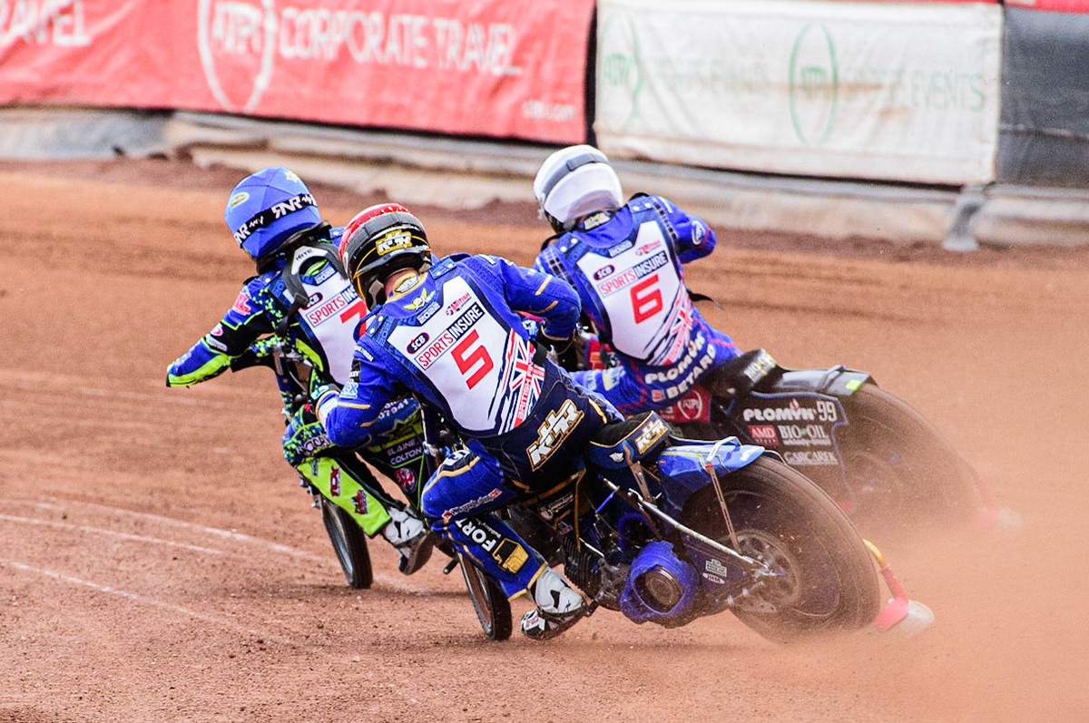 Kyle Howarth (Red) chases Paul Starke  (Blue) and Dan Bewley  (White) during the Sports Insure British Speedway Championship Final at the National Speedway Stadium, Bellevue, Manchester, England on Monday 1st August 2022. (Photo by: Ian Charles | MI News)