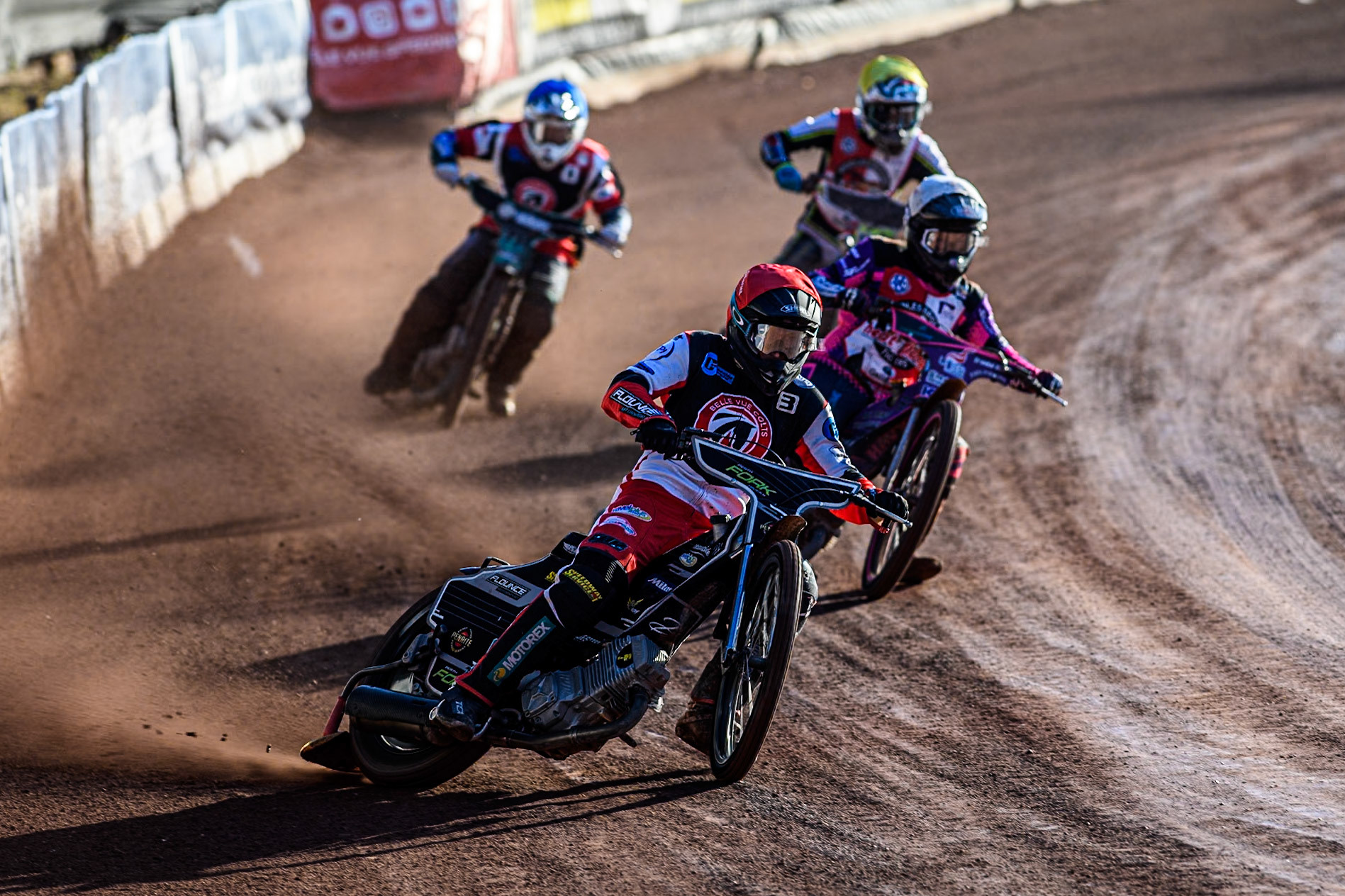 Belle Vue Colts' Matt Marson in Red leading Middlesbrough Tigers' Ben Trigger in White, Middlesbrough Tigers' Ben Rathbone in Yellow and Belle Vue Colts' Guest rider Mason Watson in Blue during the WSRA National Development League match between Belle Vue Colts and Middlesbrough Tigers at the National Speedway Stadium, Manchester on Monday 17th June 2024. (Photo: Ian Charles | MI News)